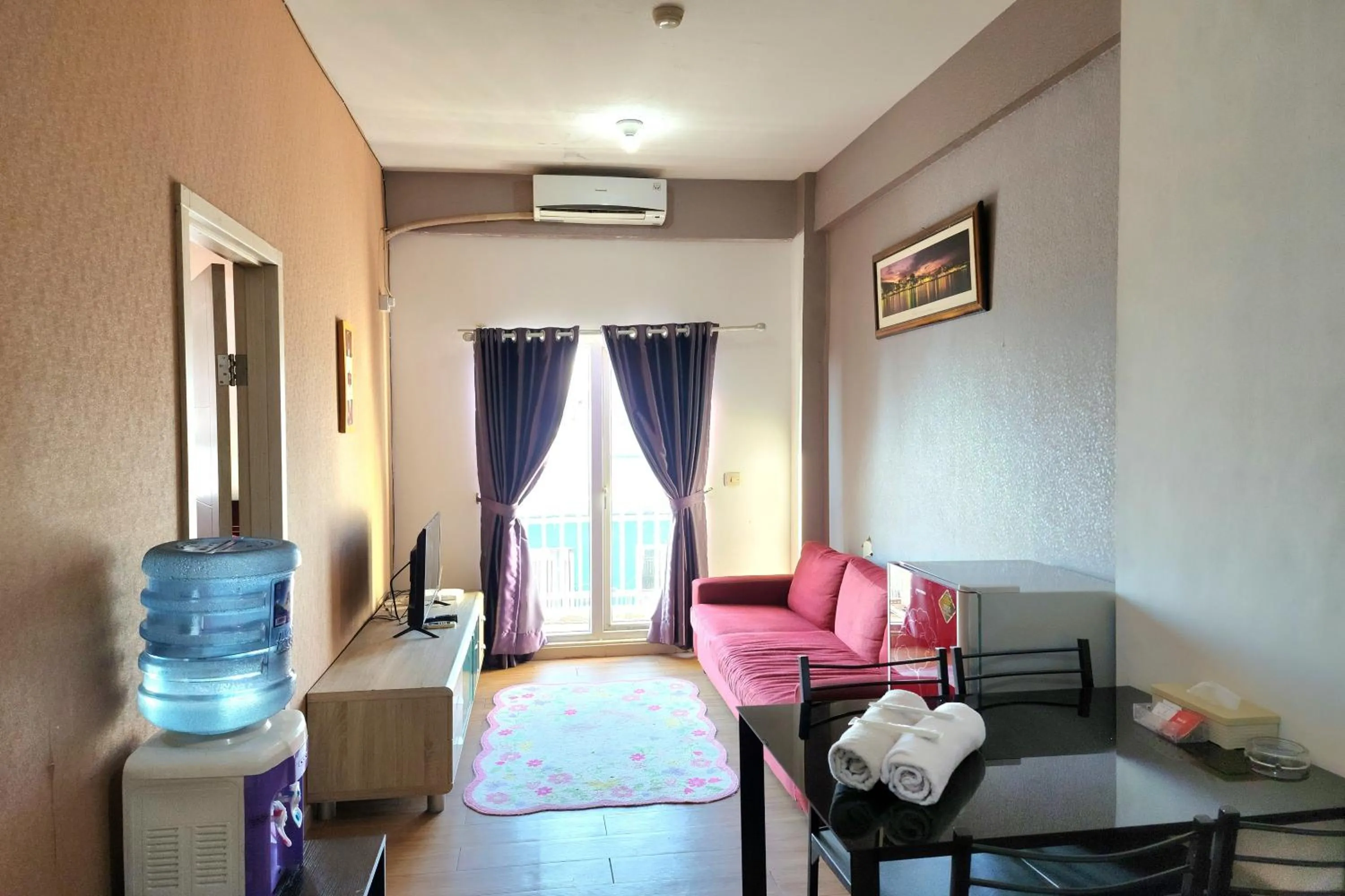 Living room in Queen Room 2 @ Grand Center Point Apartment