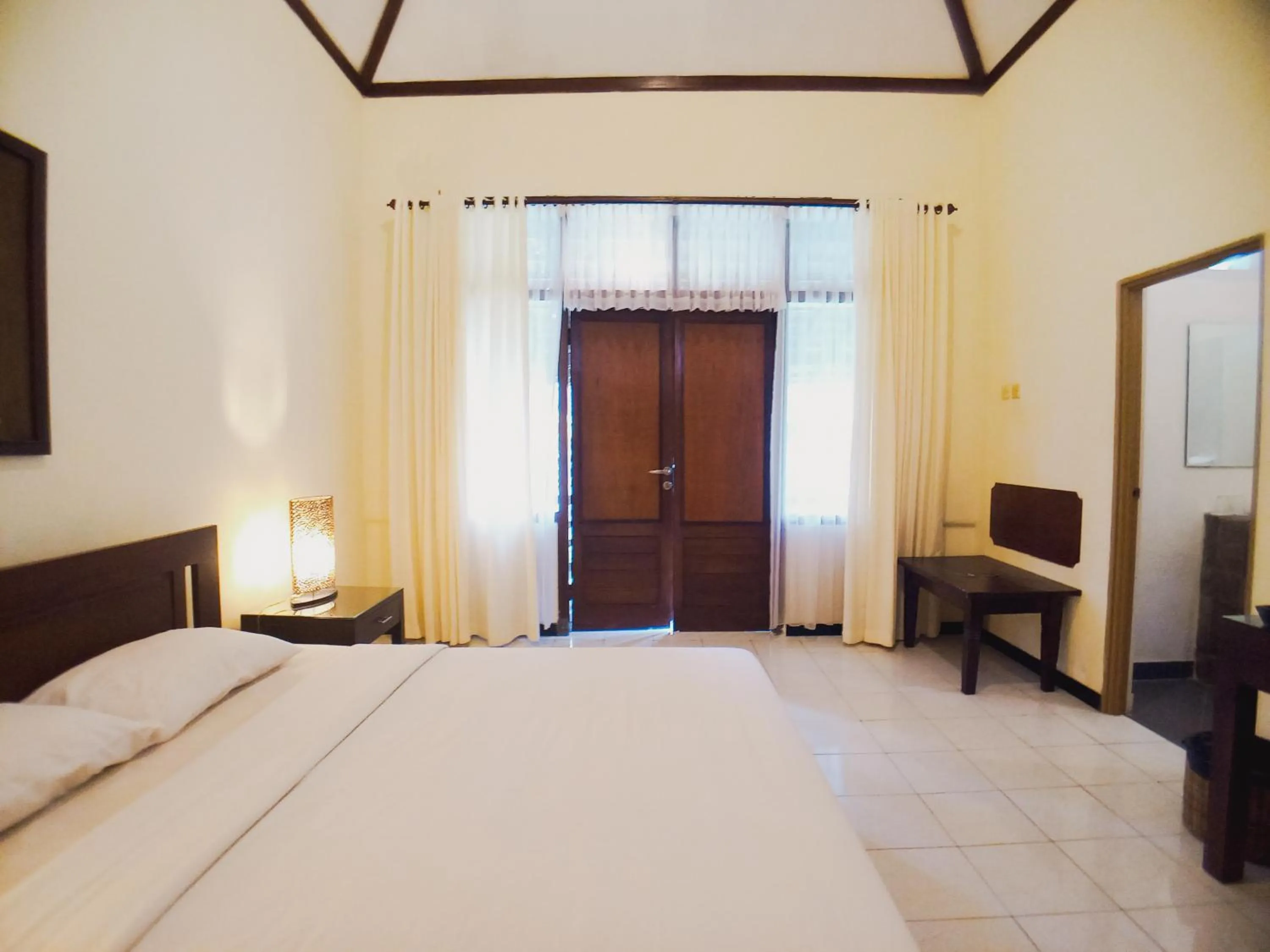 Bedroom in Margo Utomo Hill View Resort