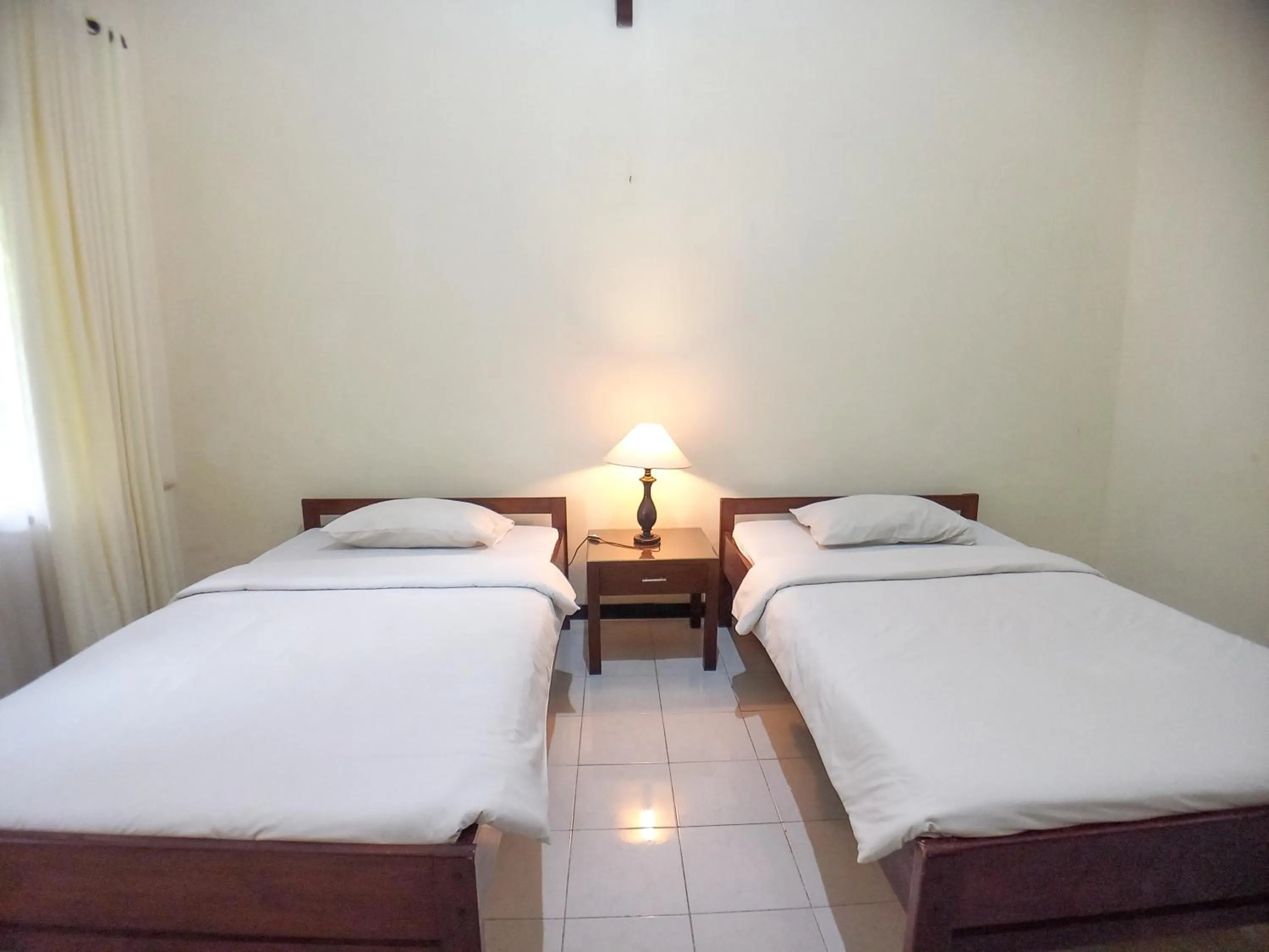 Bedroom in Margo Utomo Hill View Resort