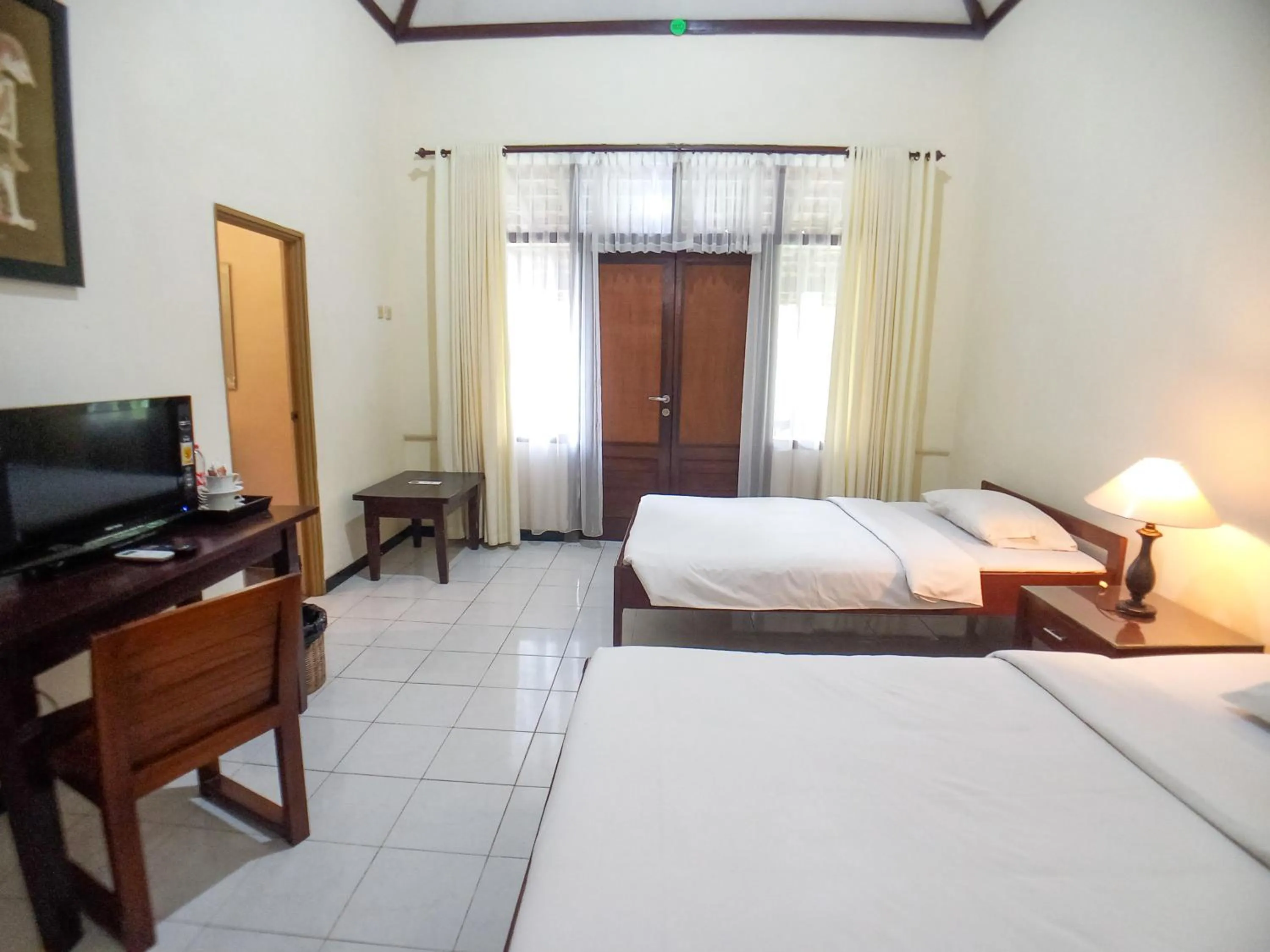 Bedroom in Margo Utomo Hill View Resort