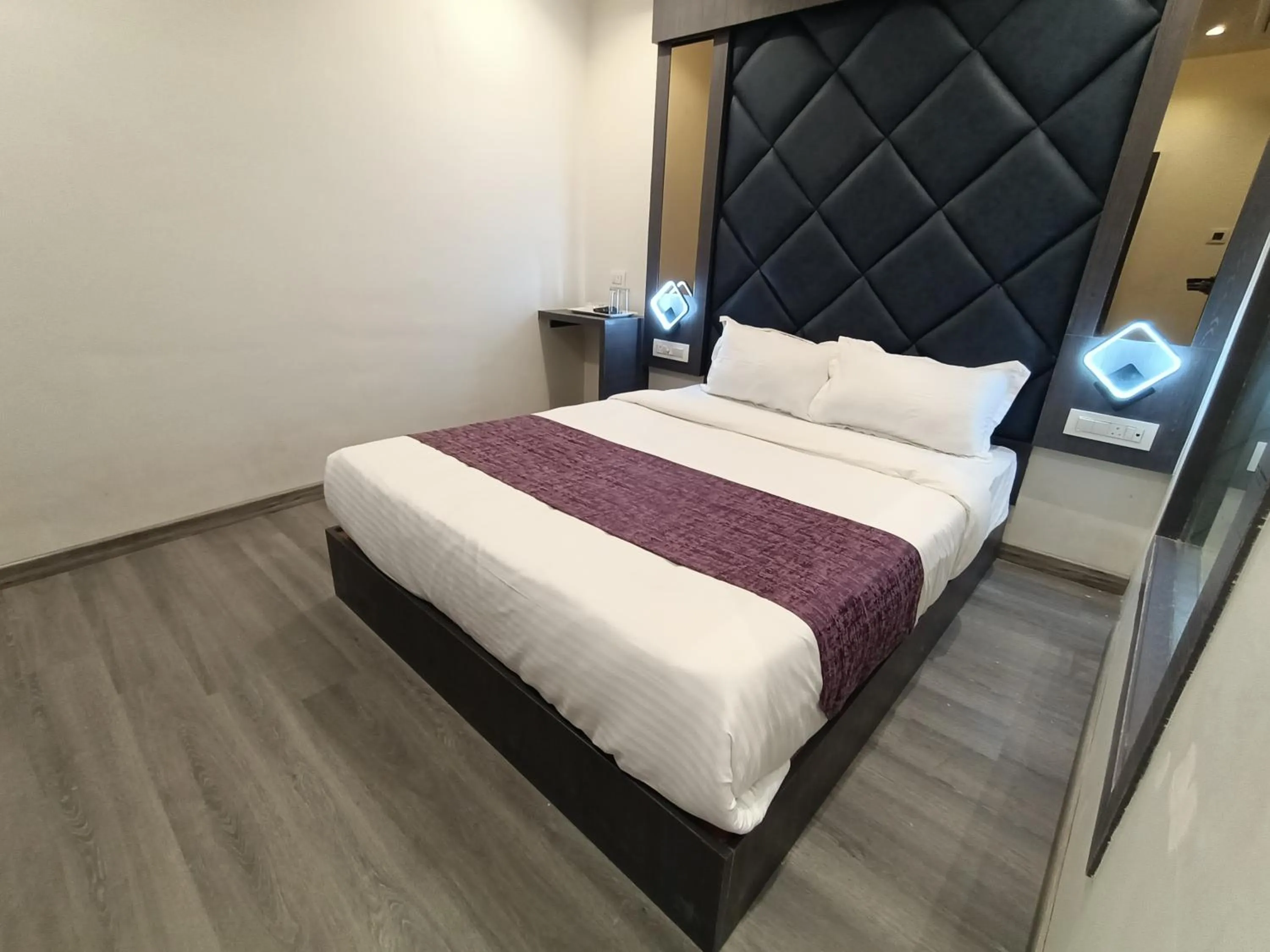 Bed in Hotel Classio Andheri - Near DN Nagar Metro Station