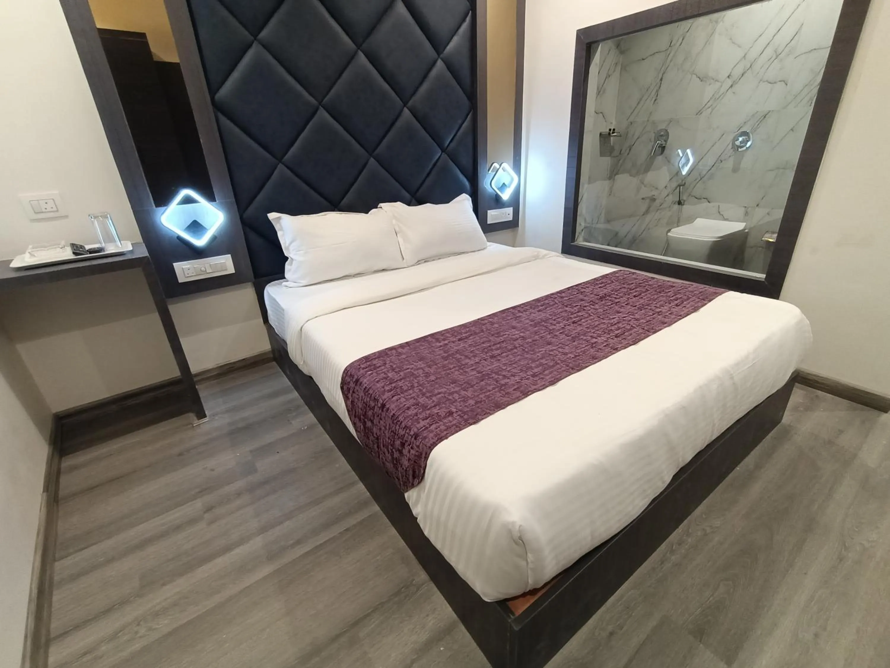 Bed in Hotel Classio Andheri - Near DN Nagar Metro Station