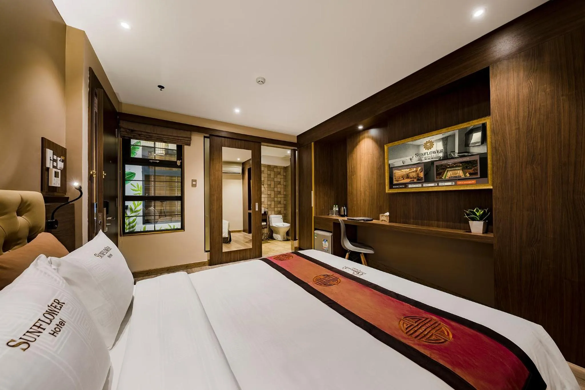 Bed in Sunflower Luxury Hotel