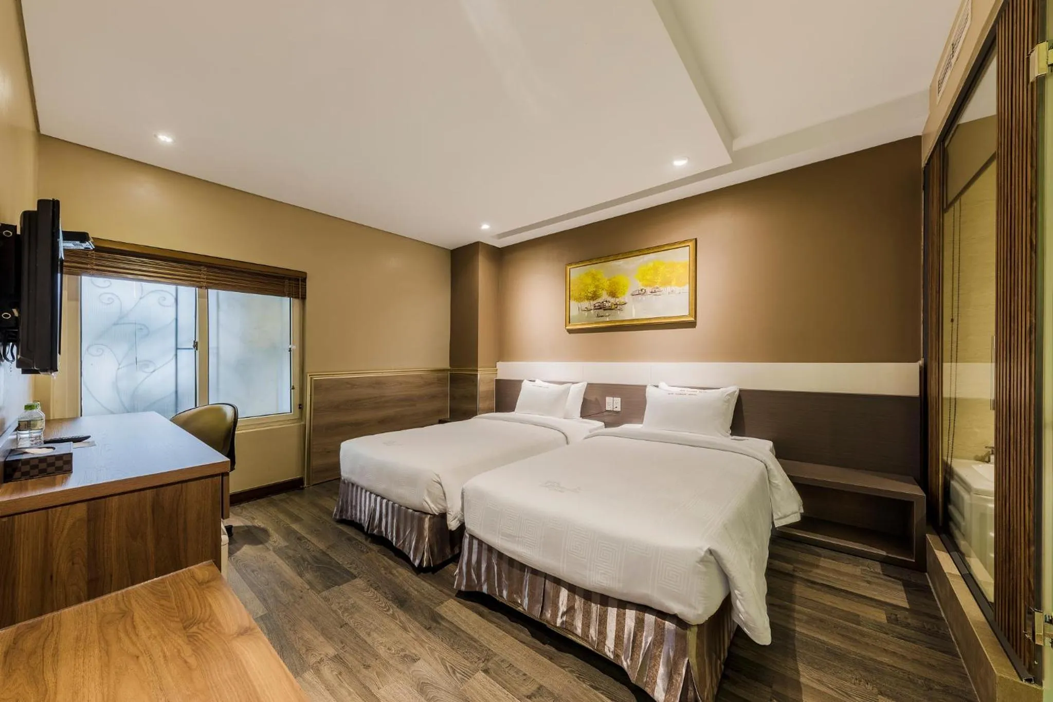 Bed in Sunflower Luxury Hotel