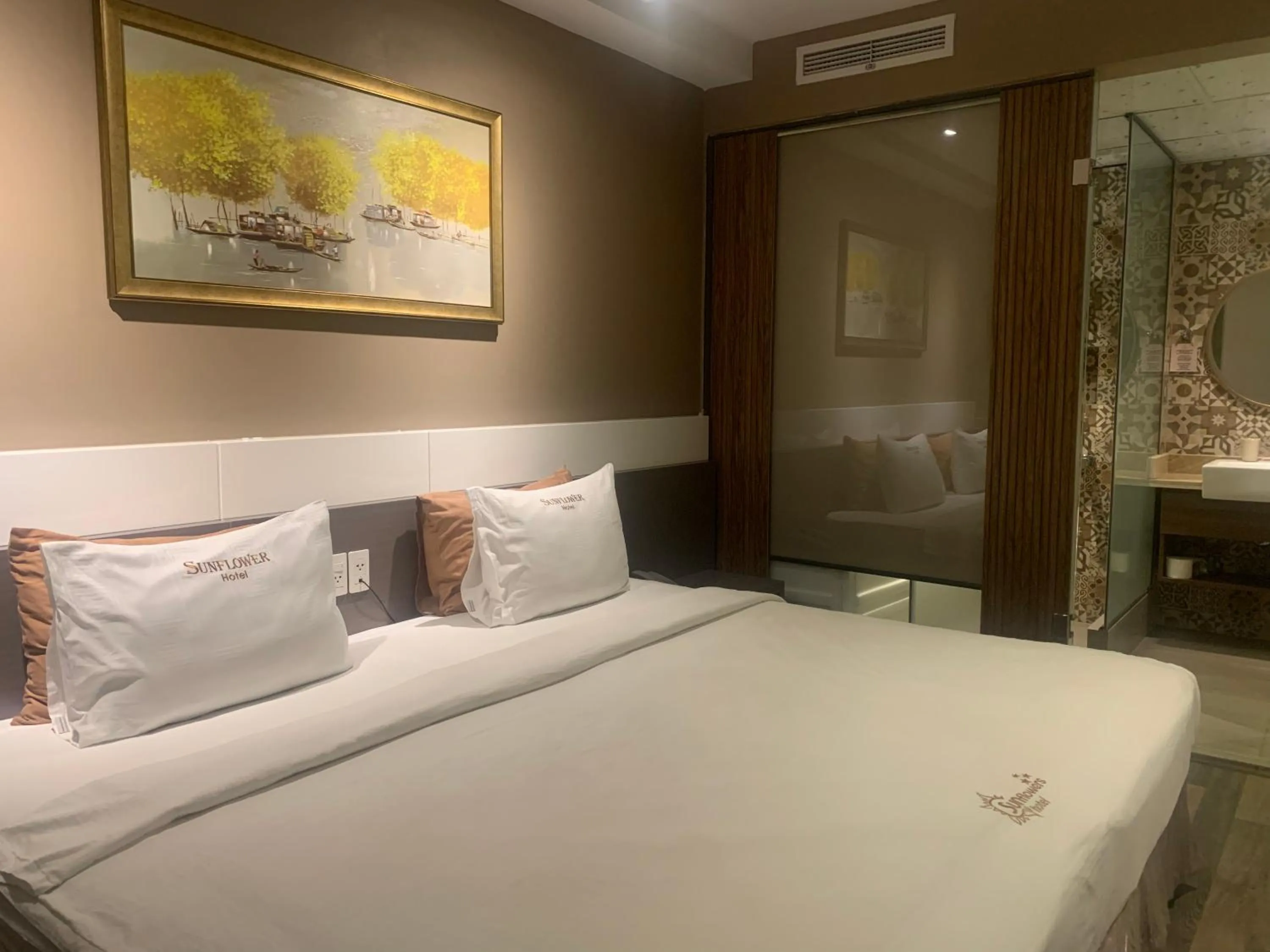 Bed in Sunflower Luxury Hotel