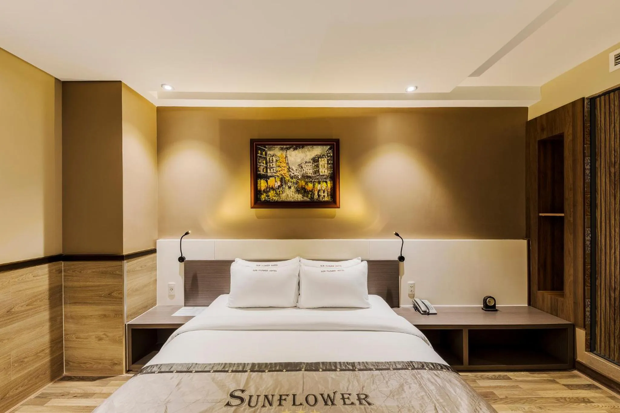 Bed in Sunflower Luxury Hotel
