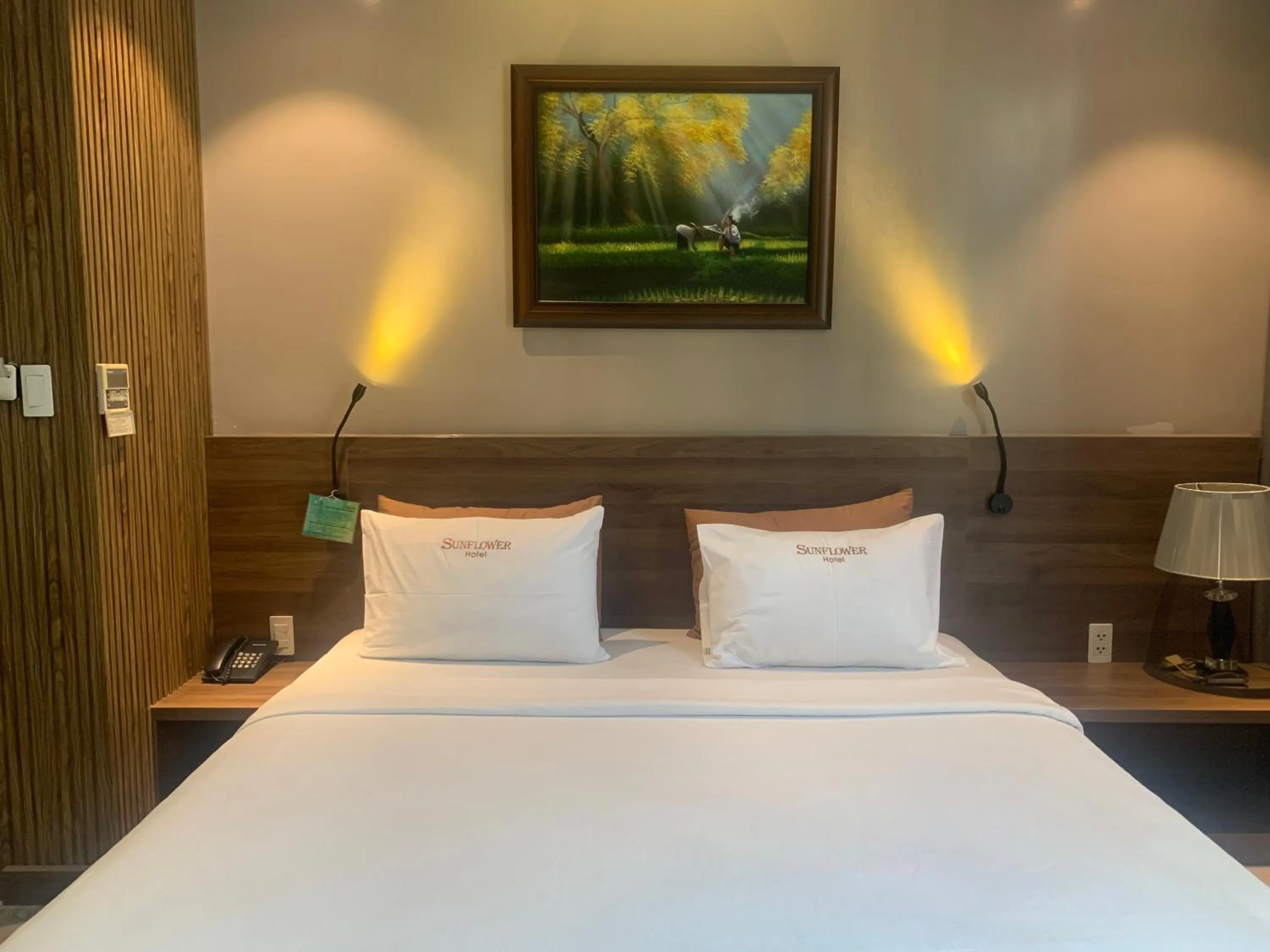 Bed in Sunflower Luxury Hotel