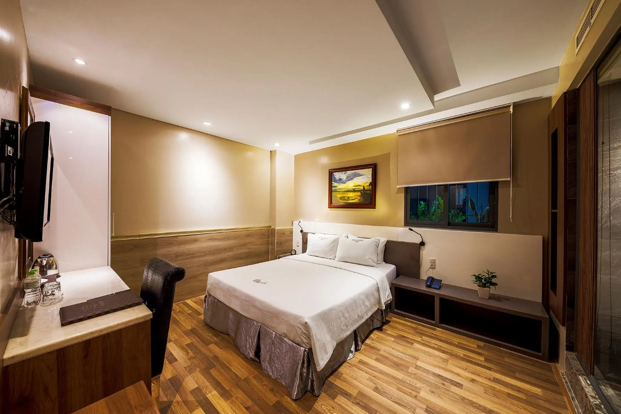 Bed in Sunflower Luxury Hotel