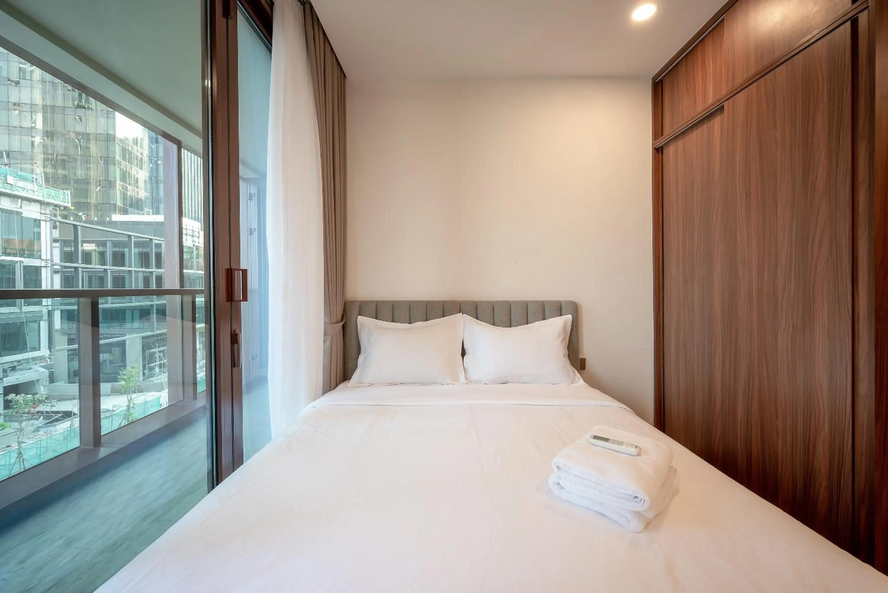 Bed in Metropole Thu Thiem Condo Apartment