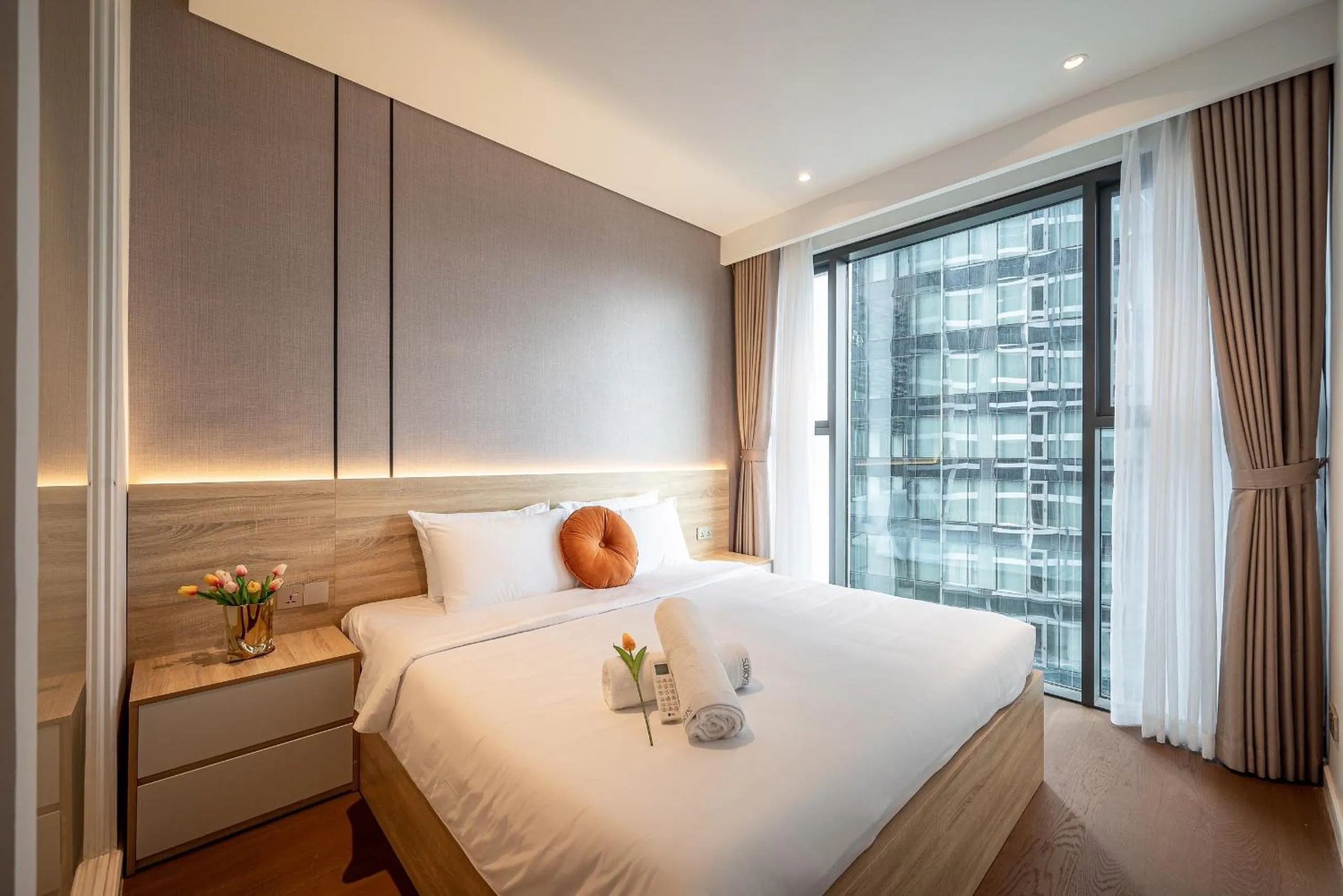 Bed in Metropole Thu Thiem Condo Apartment