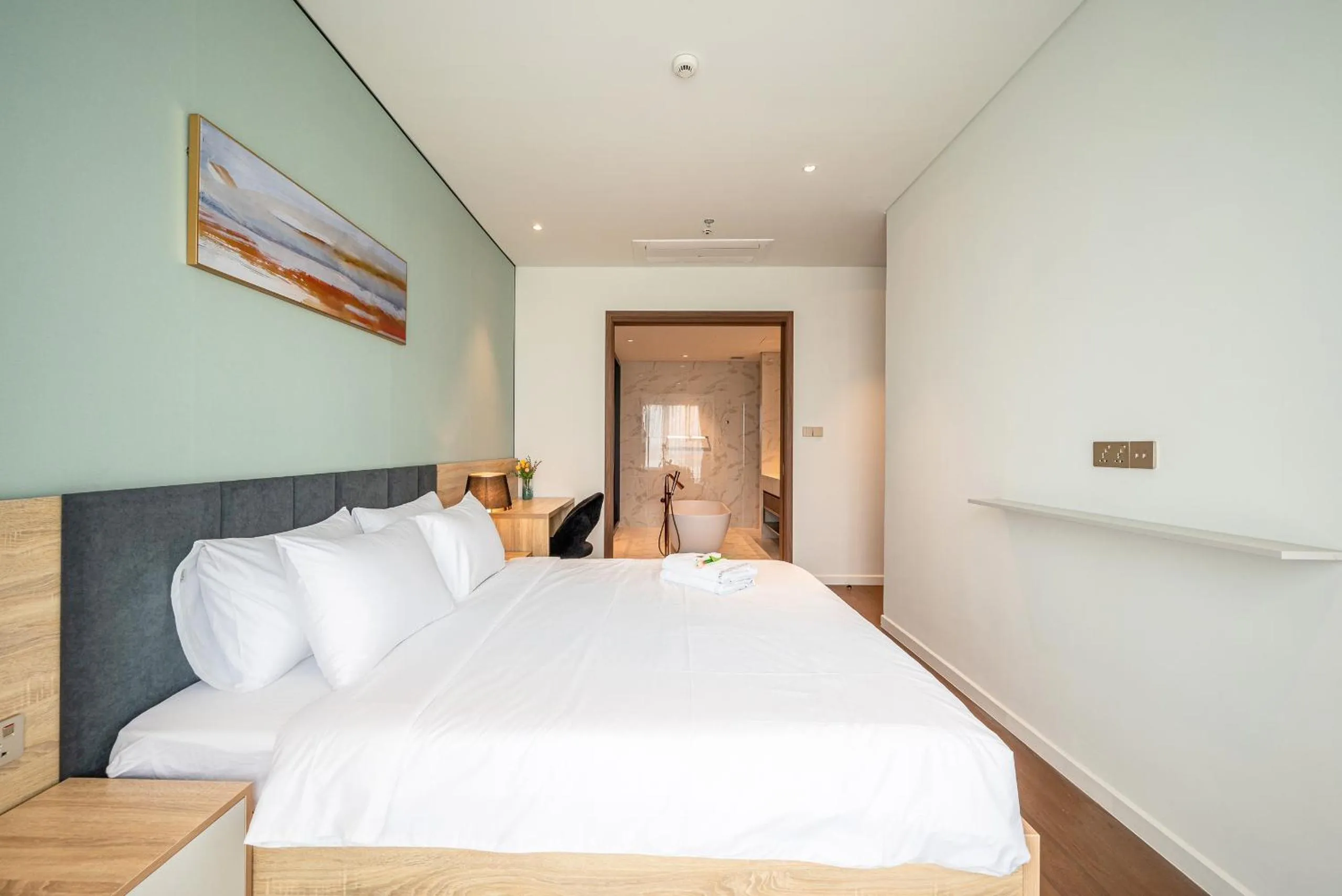 Bed in Metropole Thu Thiem Condo Apartment