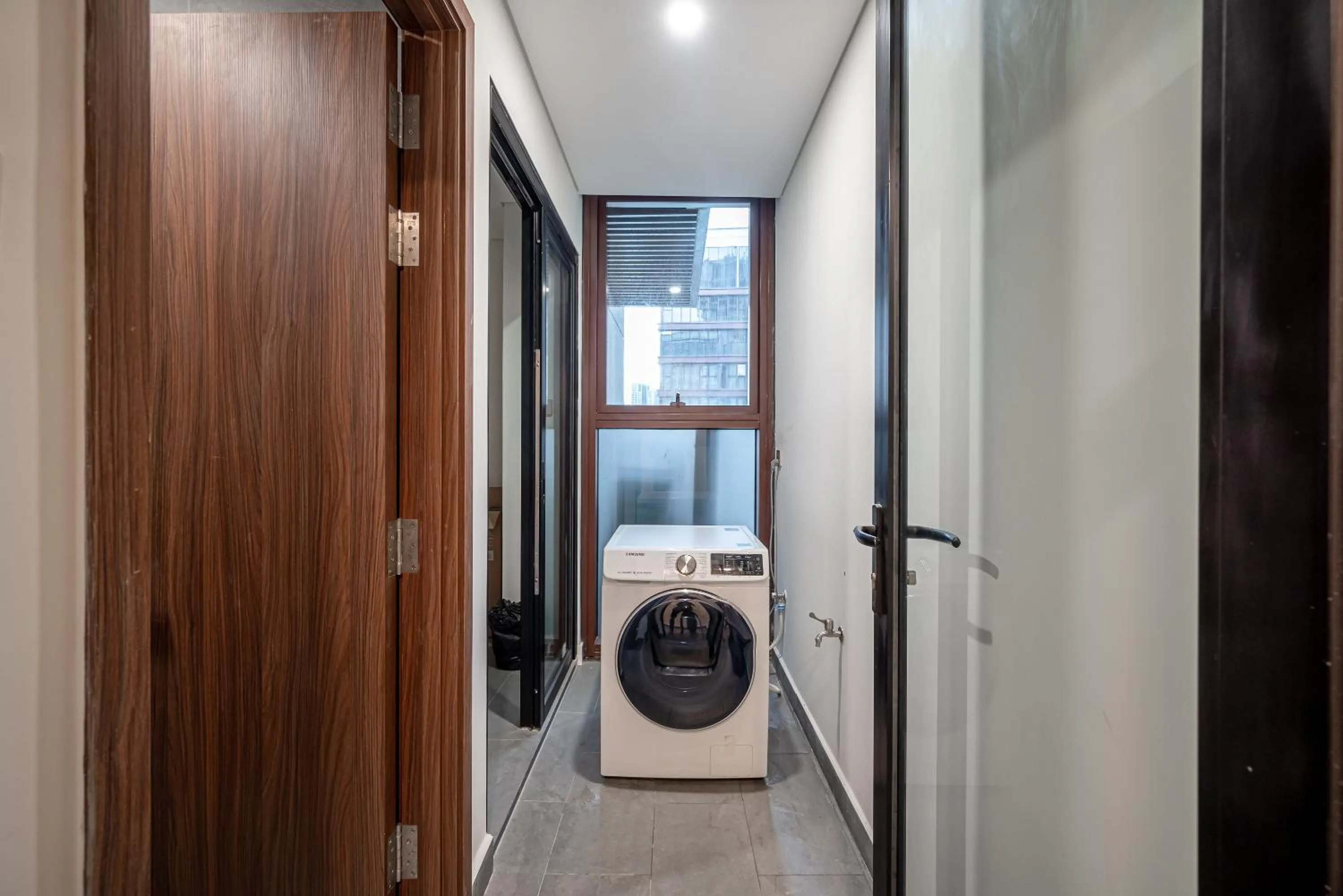 washing machine in Metropole Thu Thiem Condo Apartment