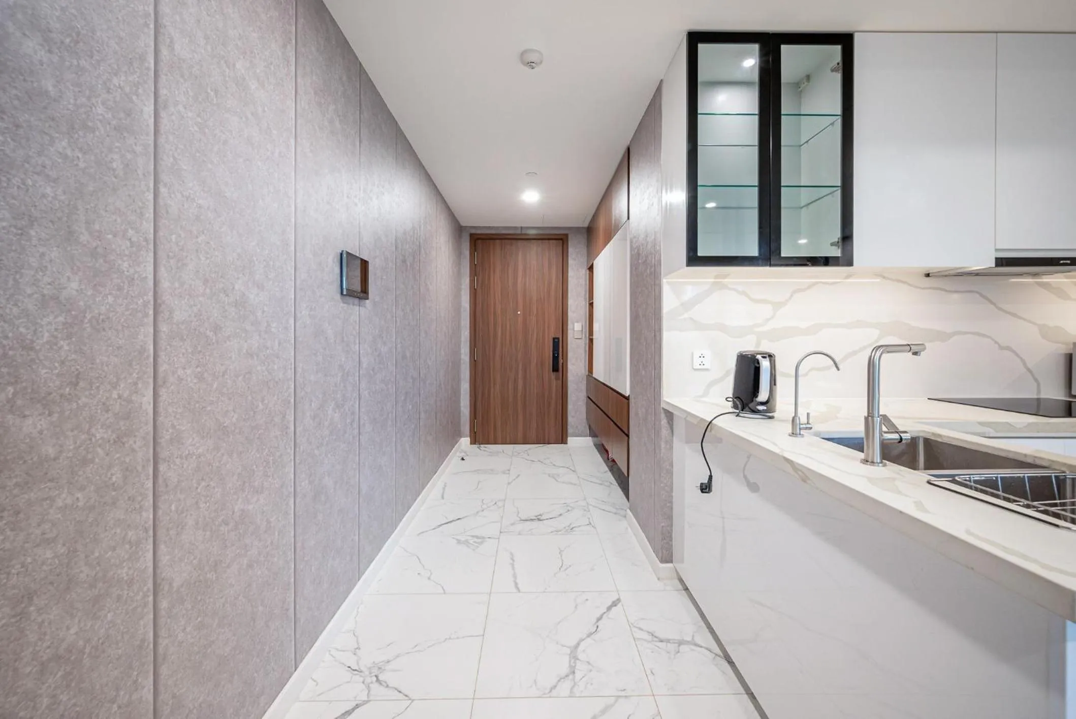 Communal lounge/ TV room in Metropole Thu Thiem Condo Apartment