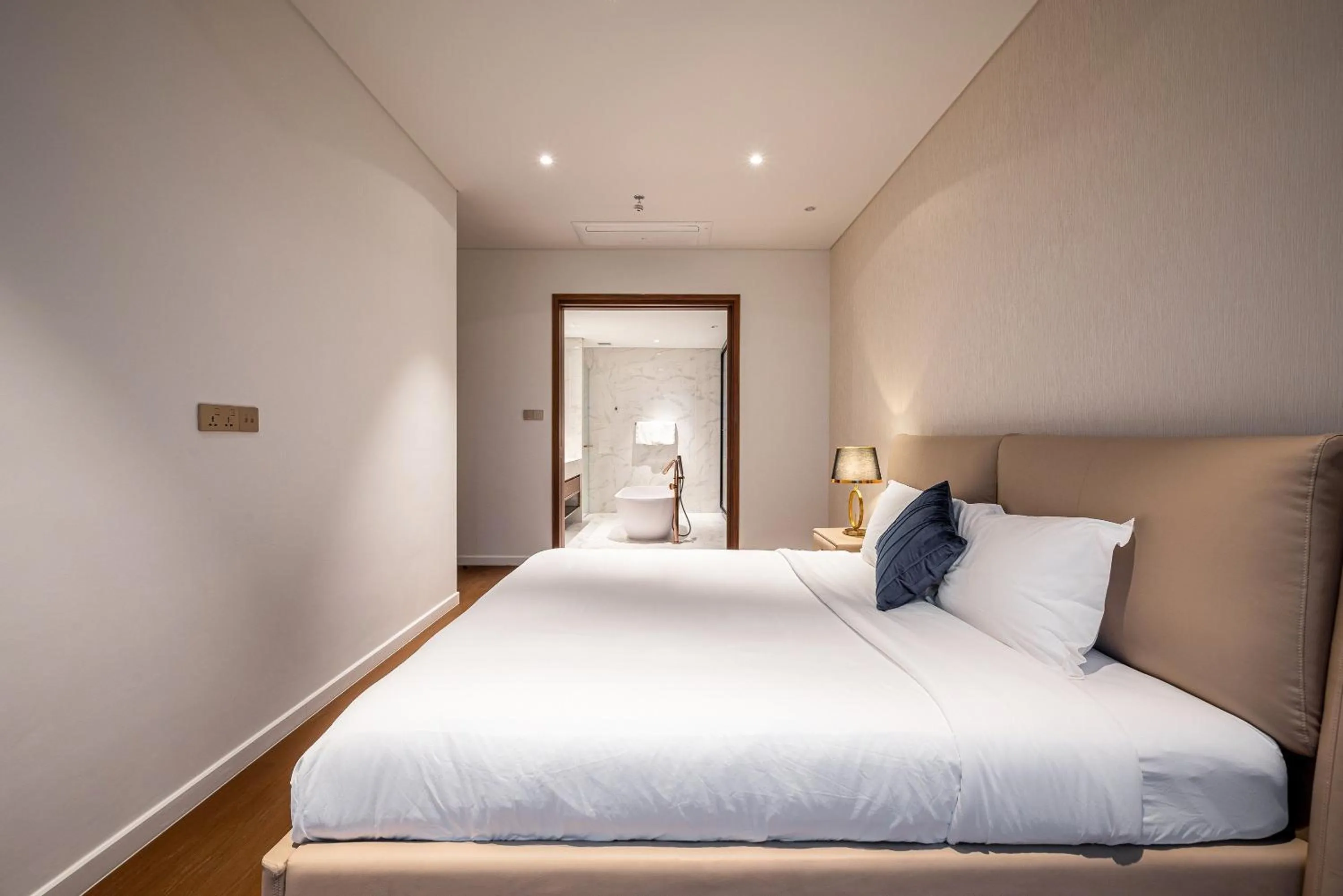 Bed in Metropole Thu Thiem Condo Apartment