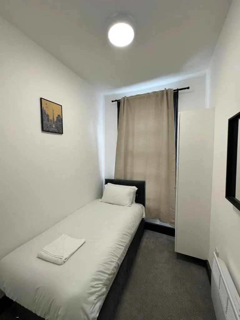 Bed in Ivy House Hotel