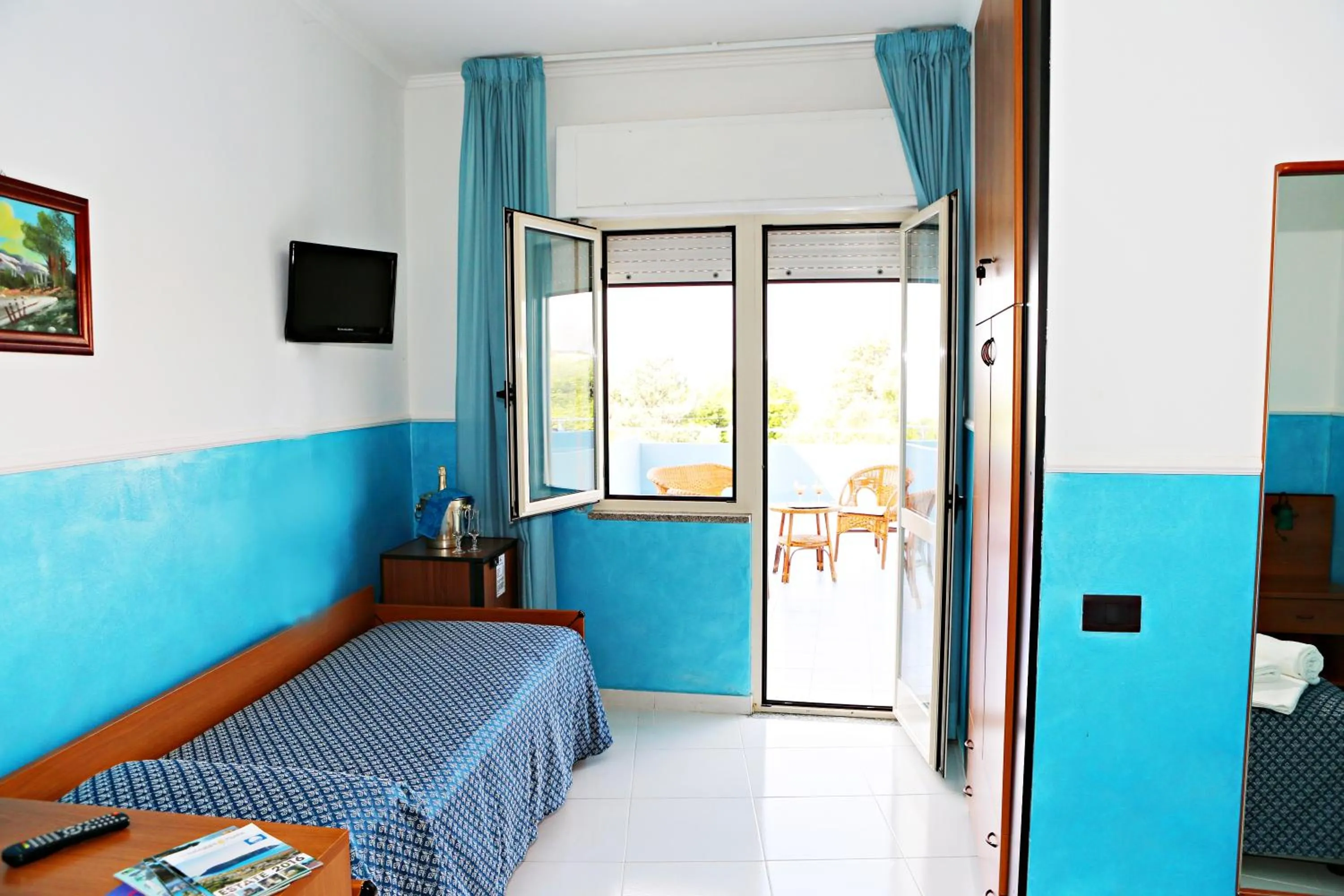 Bed in Hotel Blu Eden