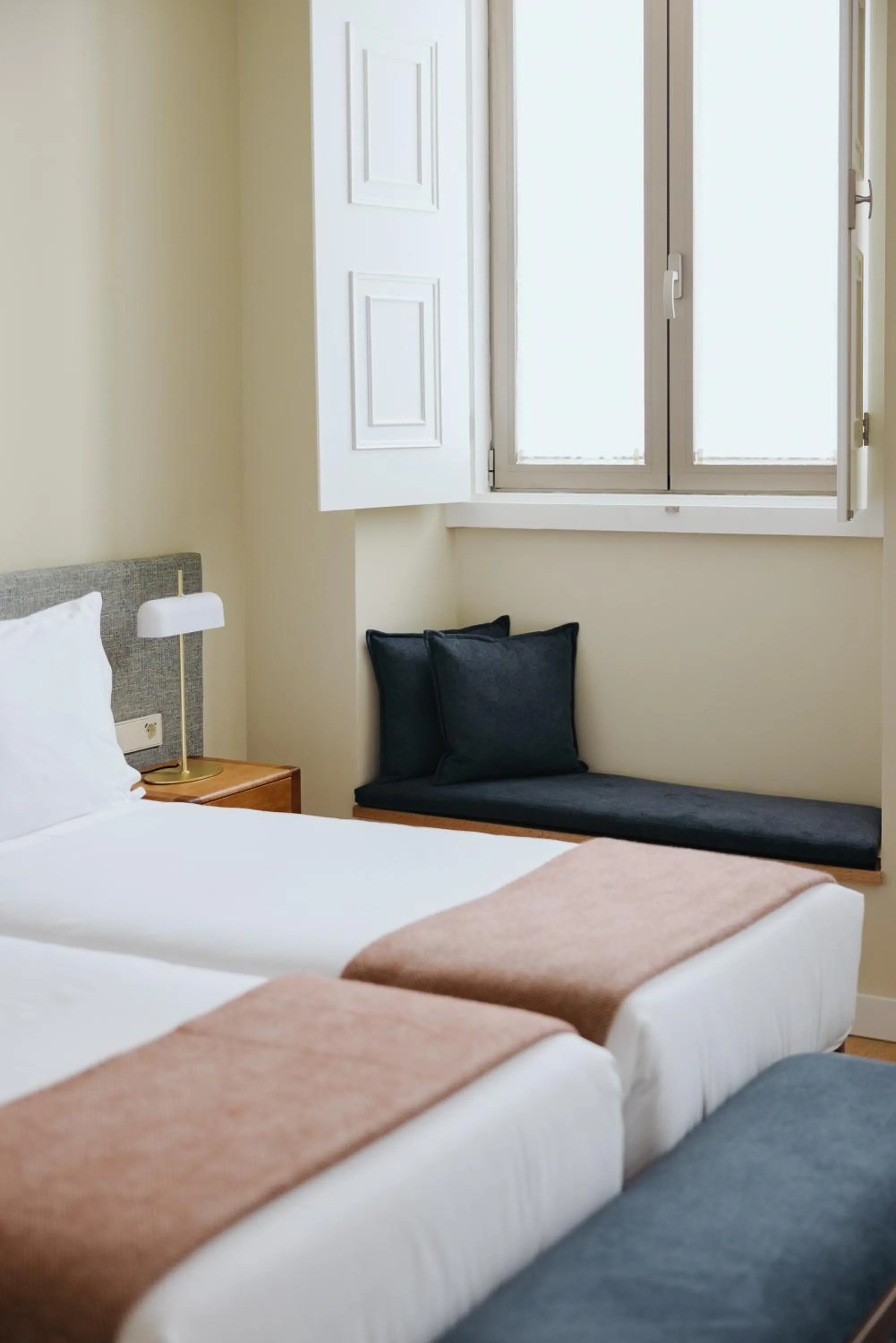 Bed in NINE DOTS Azorean Art Boutique Hotel