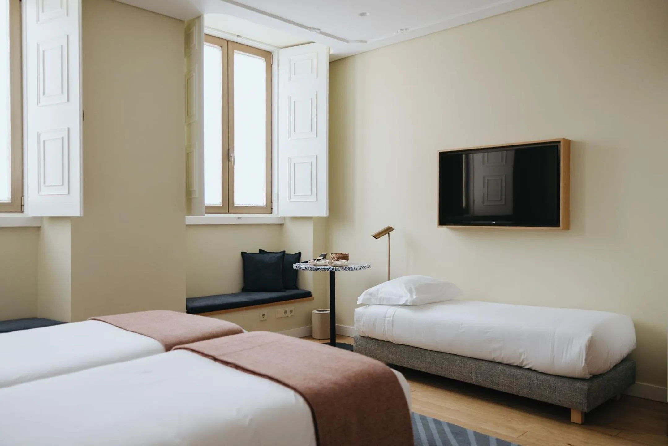 Bed in NINE DOTS Azorean Art Boutique Hotel