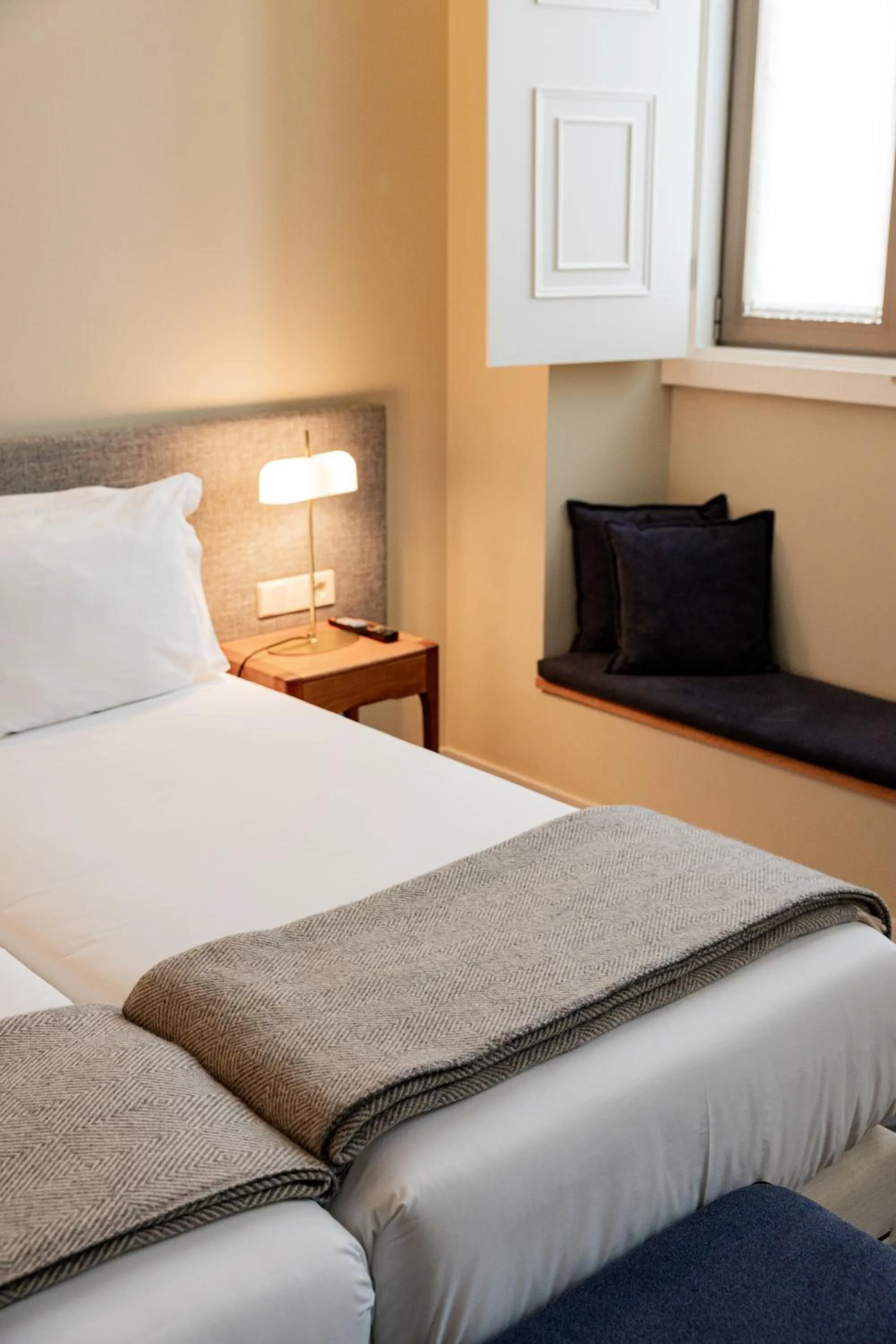 Bed in NINE DOTS Azorean Art Boutique Hotel