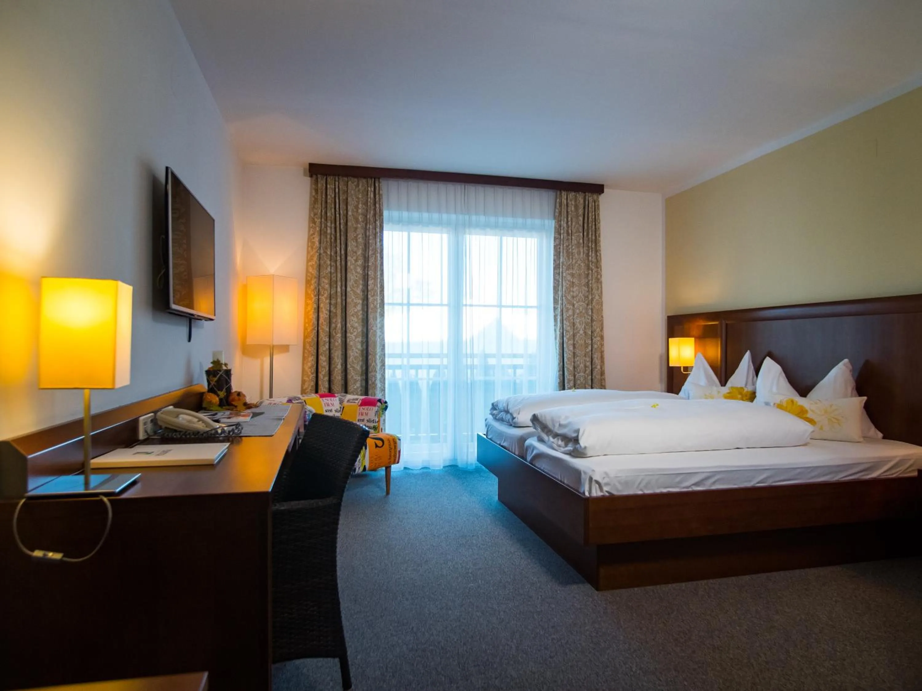 Photo of the whole room, Bed in Tennis Golf Hotel Höllrigl