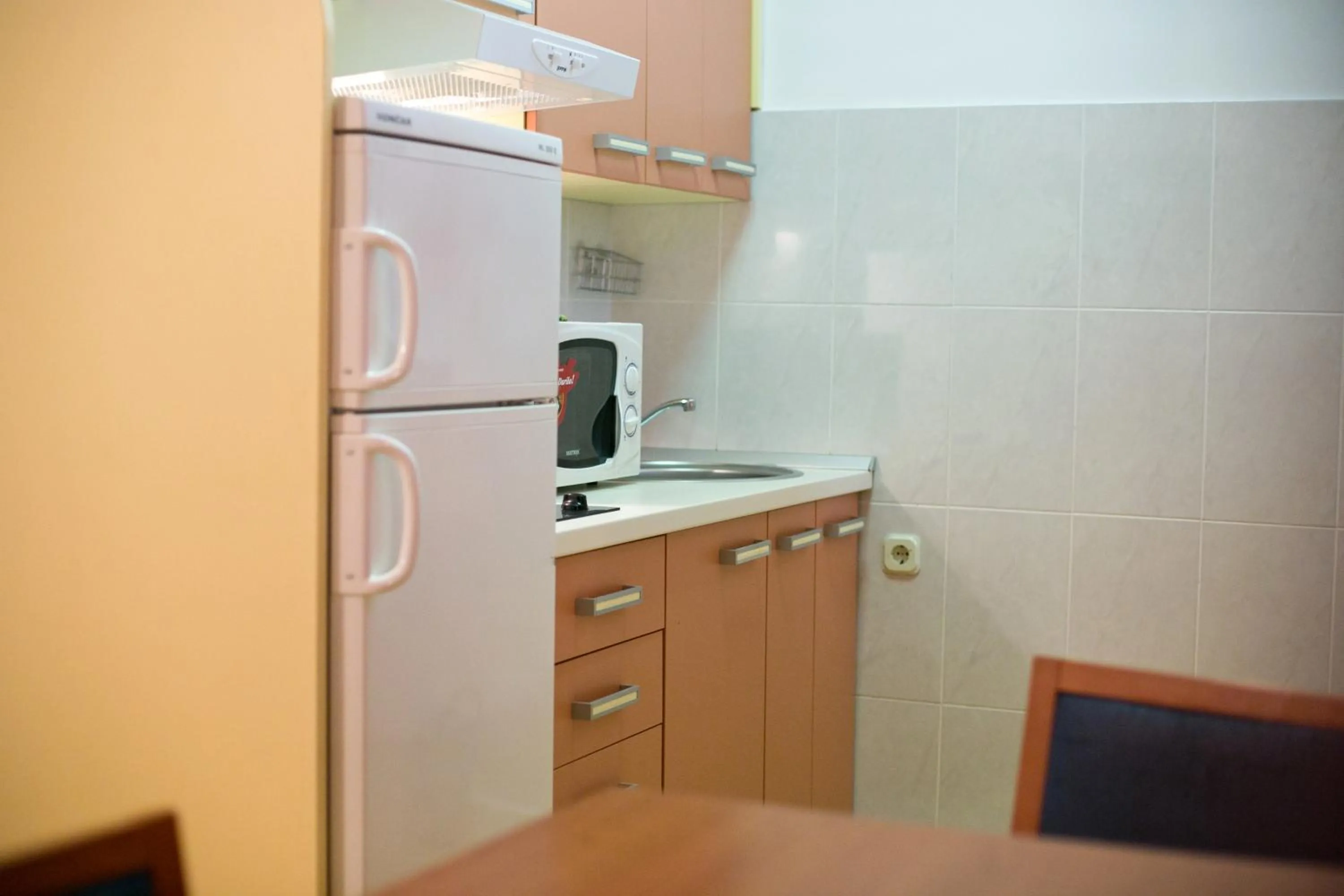 Kitchen or kitchenette in Epicenter Apartments Split