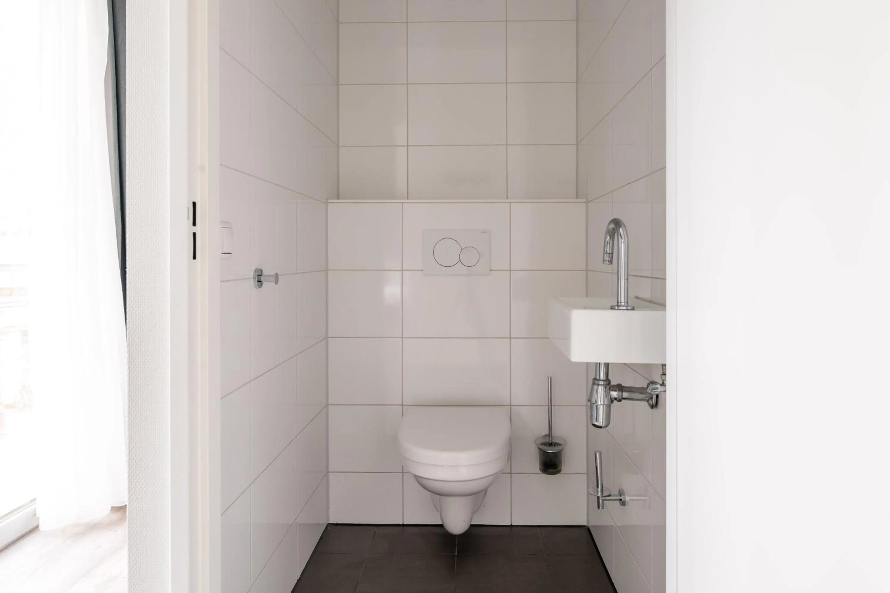 Toilet in YAYS Amsterdam Prince Island by Numa