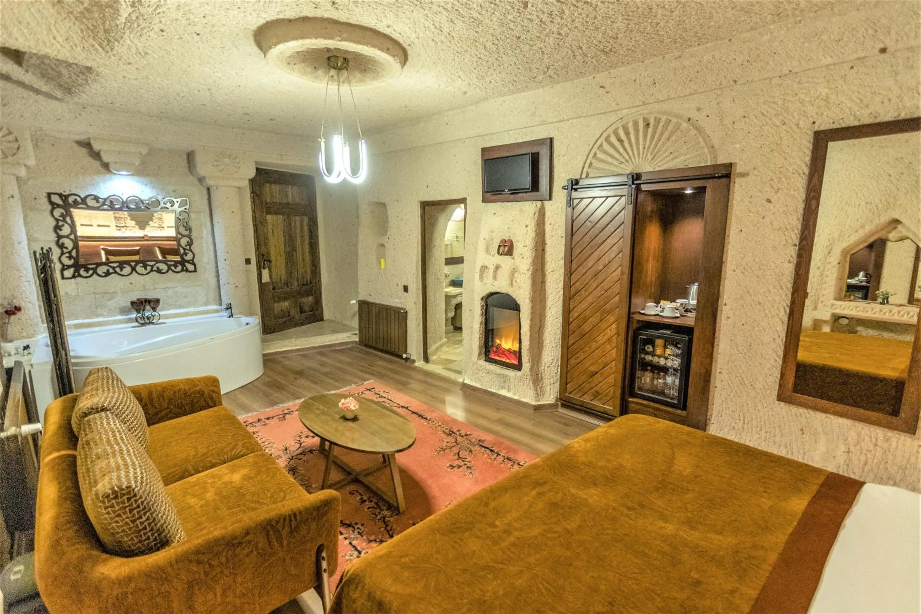 Bed in Mimi Cappadocia Luxury Cave Hotel