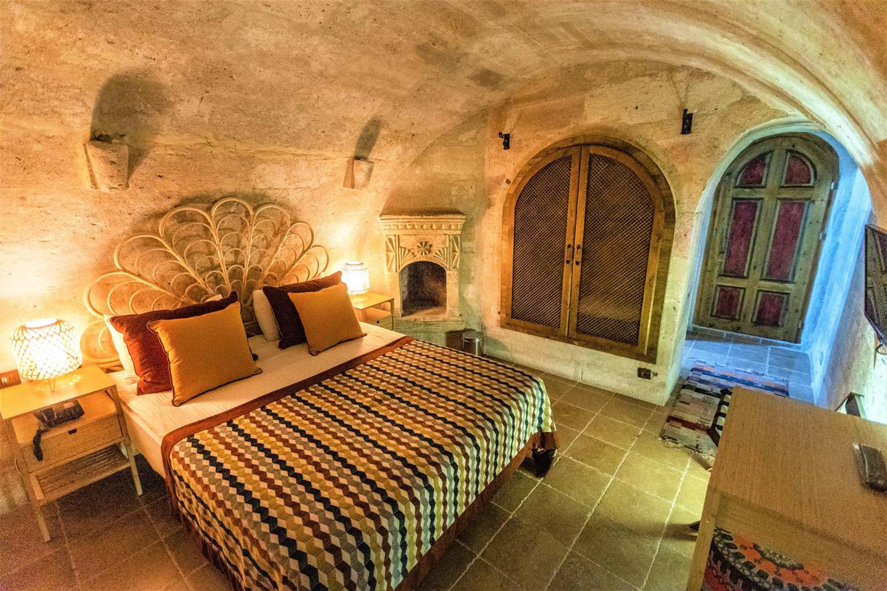 Bed in Mimi Cappadocia Luxury Cave Hotel