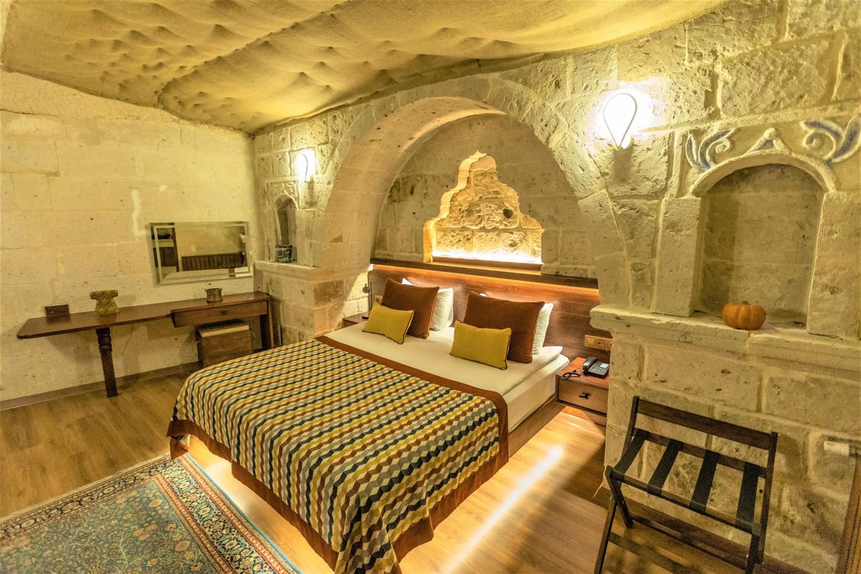 Bed in Mimi Cappadocia Luxury Cave Hotel