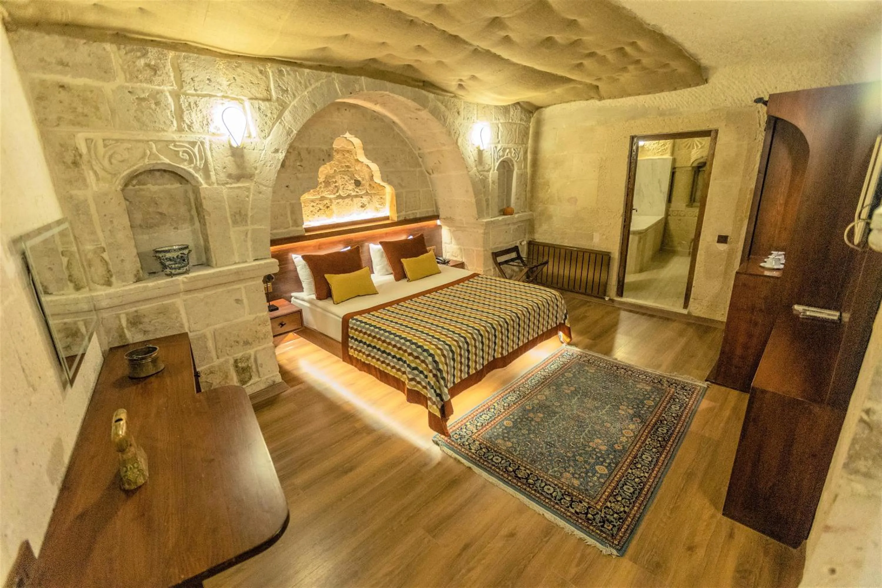 Bed in Mimi Cappadocia Luxury Cave Hotel