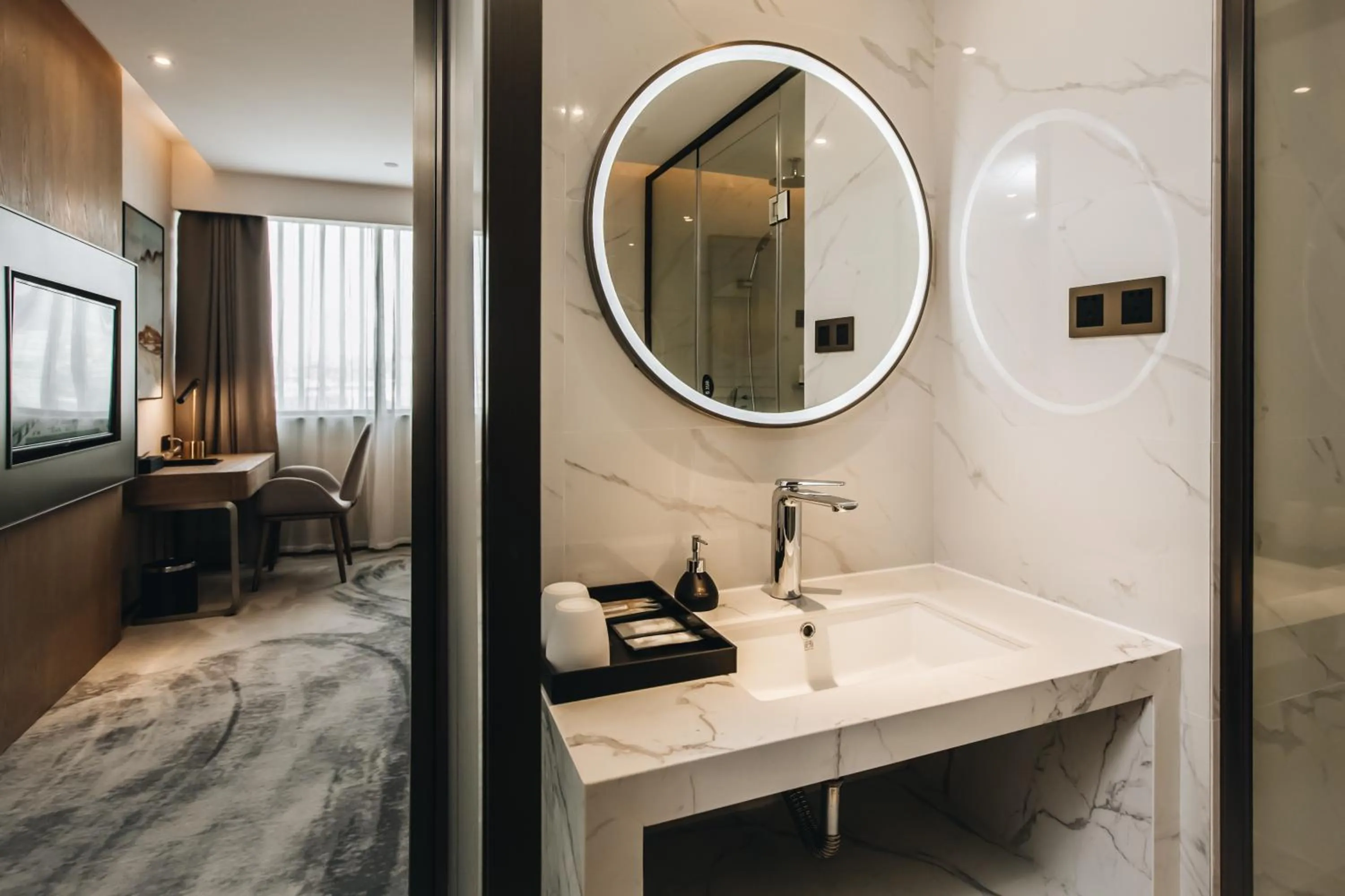 Photo of the whole room in Orienwit Hotel-Free Shuttle Bus fir Canton Fair