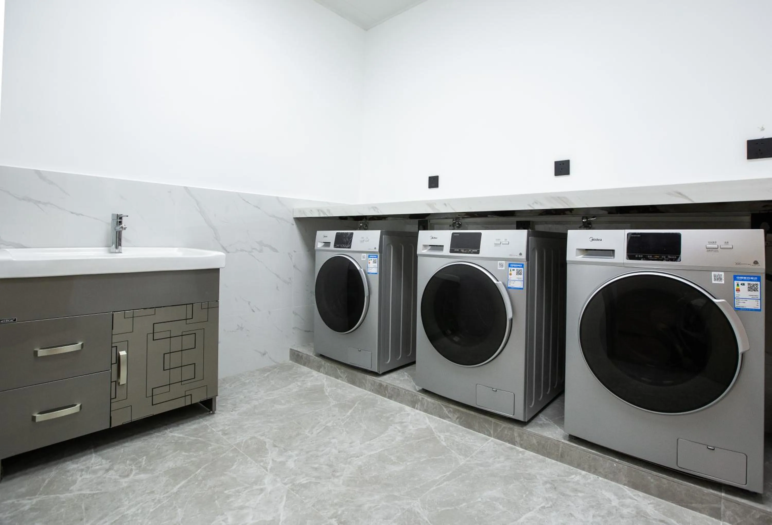 washing machine in Orienwit Hotel-Free Shuttle Bus fir Canton Fair