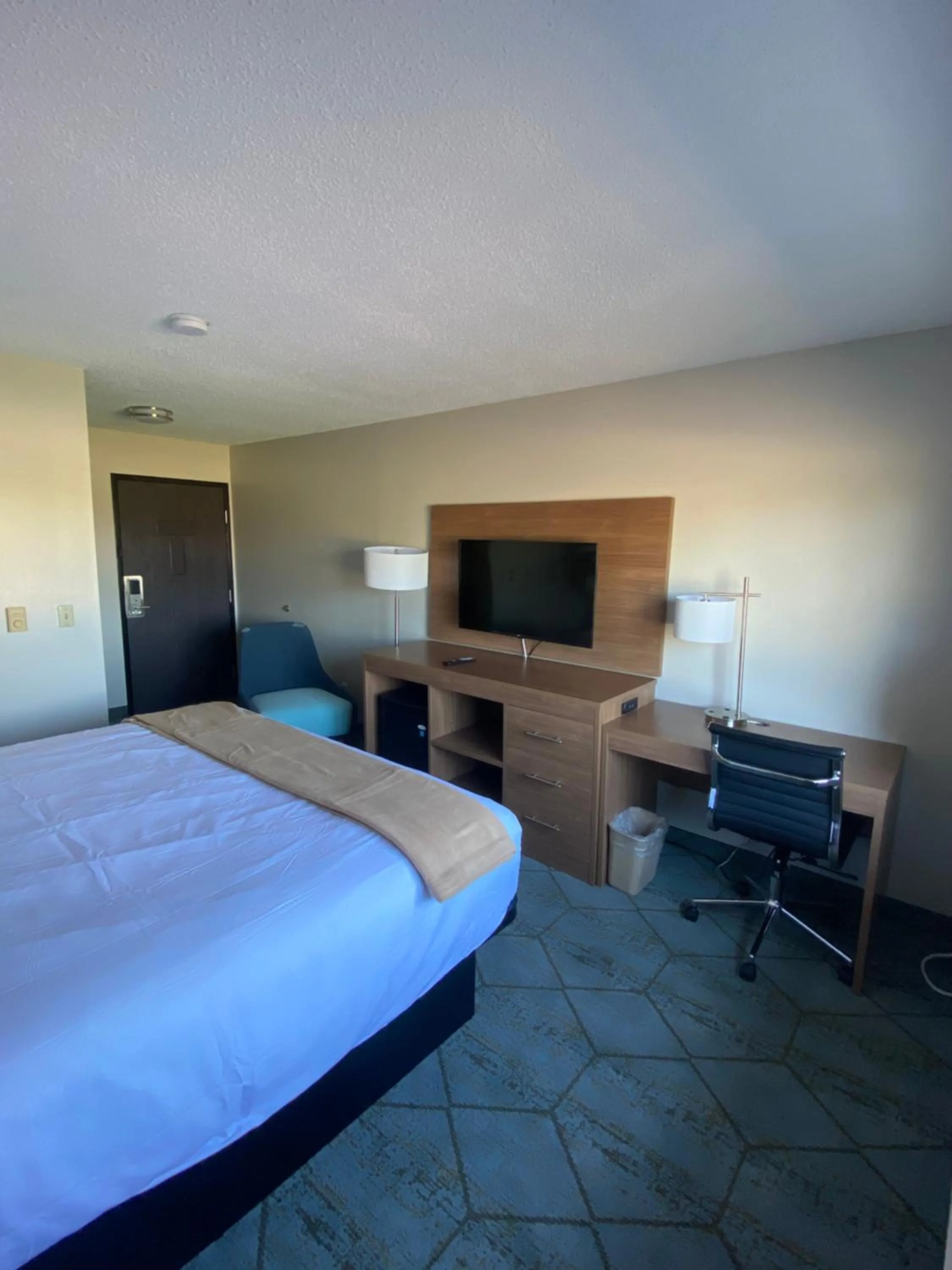 Bed in Super 8 by Wyndham Oshkosh Airport