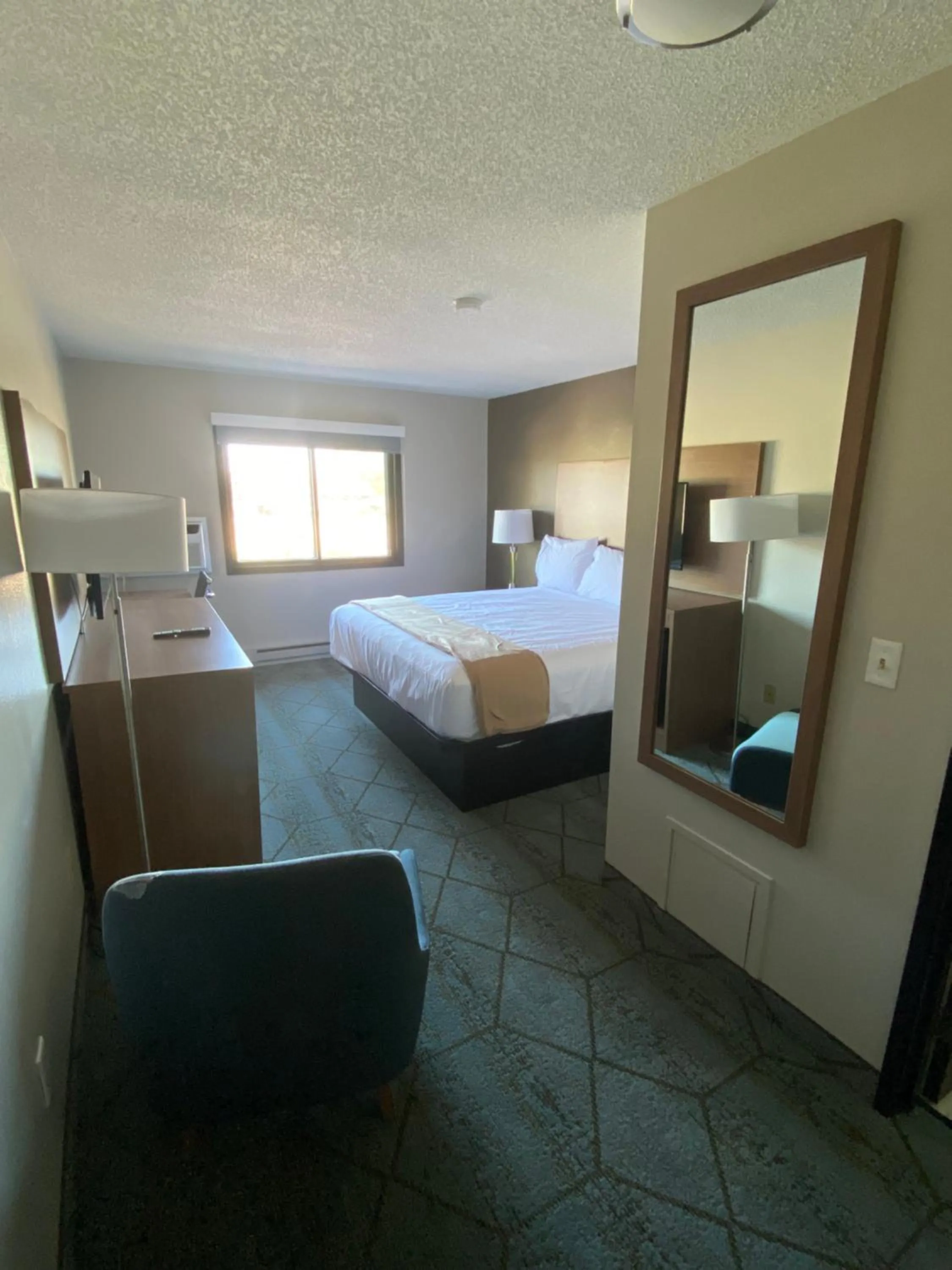 Bed in Super 8 by Wyndham Oshkosh Airport