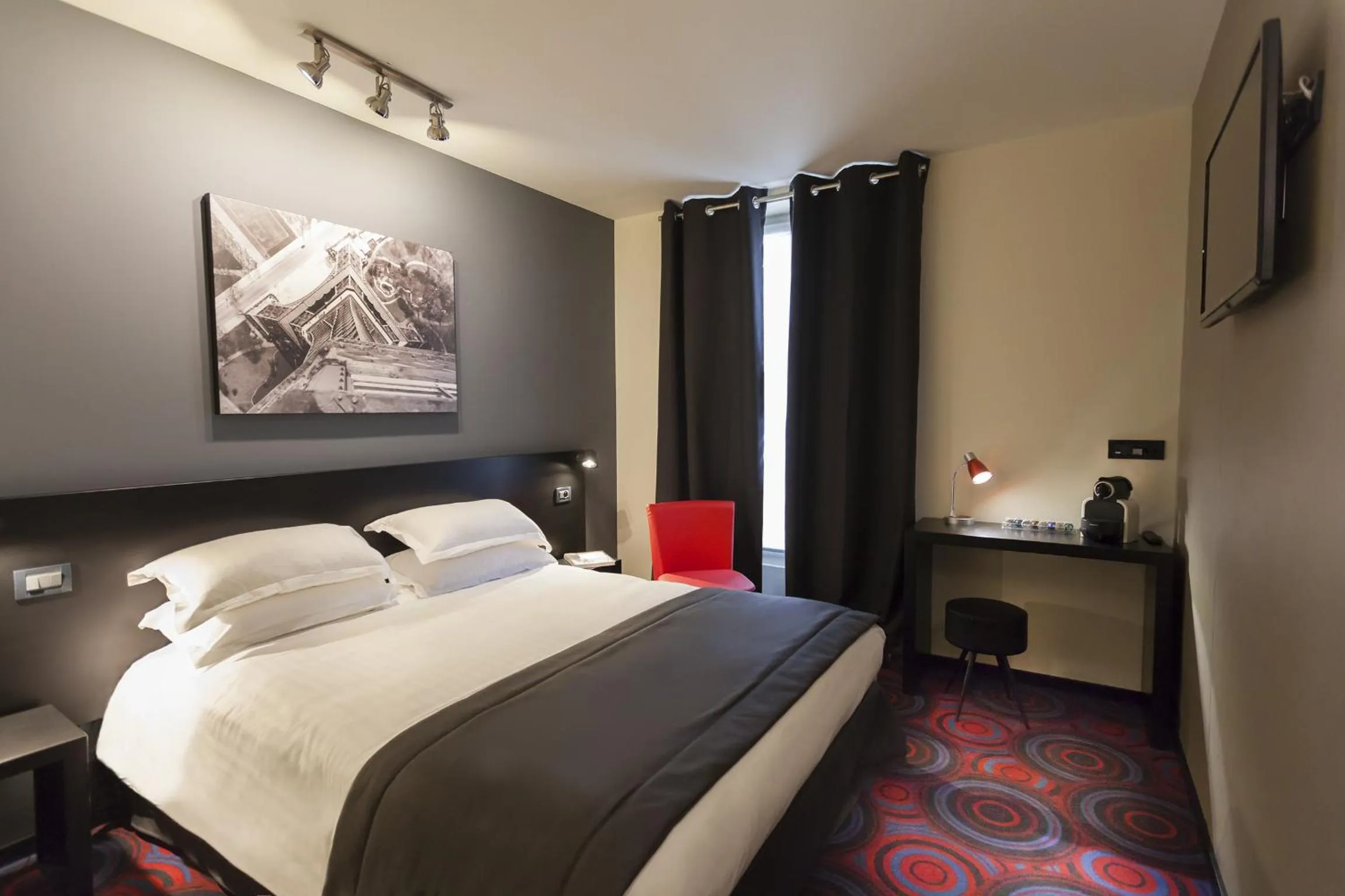 Bed in Helussi Hôtel