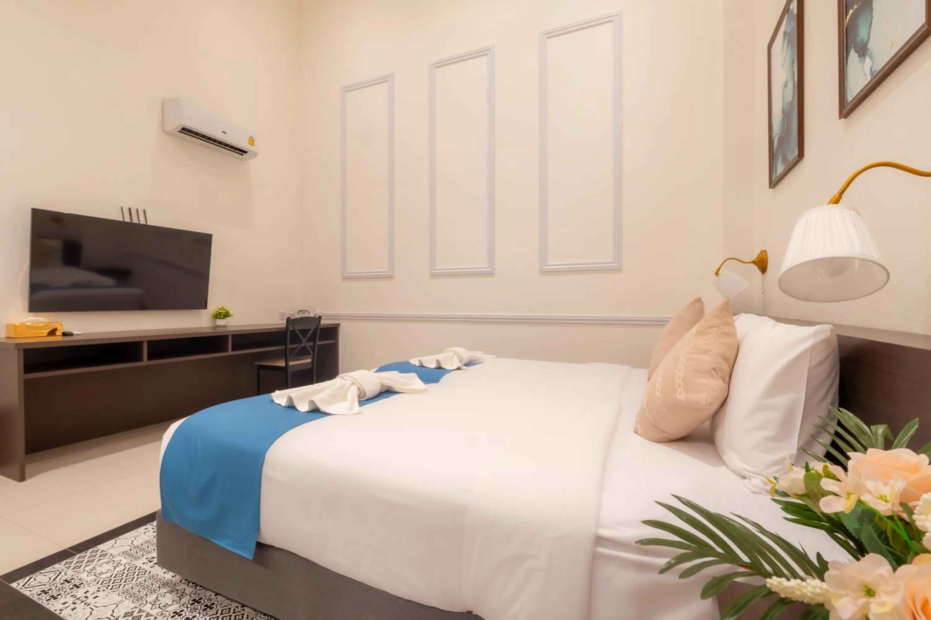 Bed in Le ville lanna Chiang Mai Gate Old Town Hotel