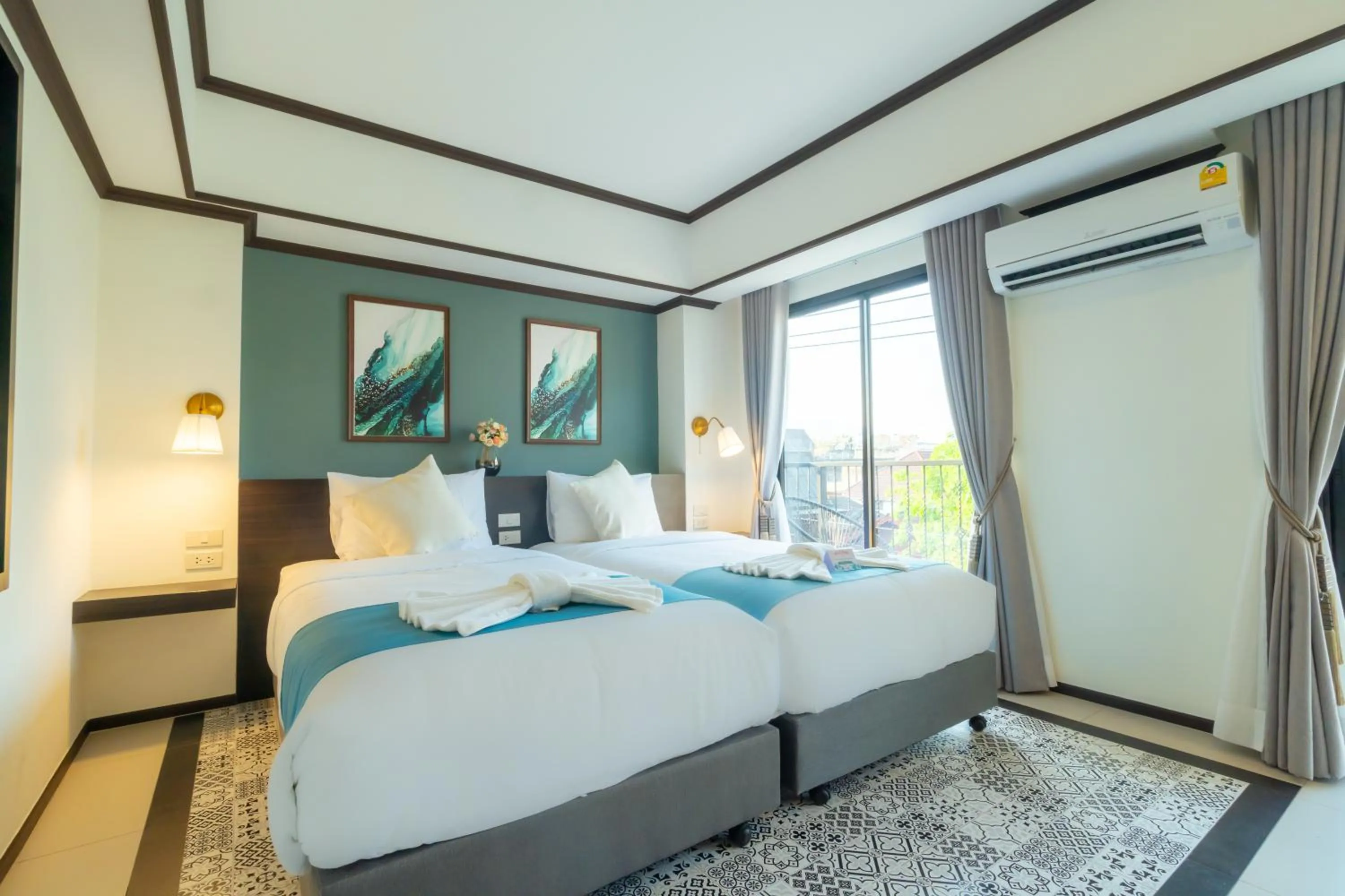 Bed in Le ville lanna Chiang Mai Gate Old Town Hotel