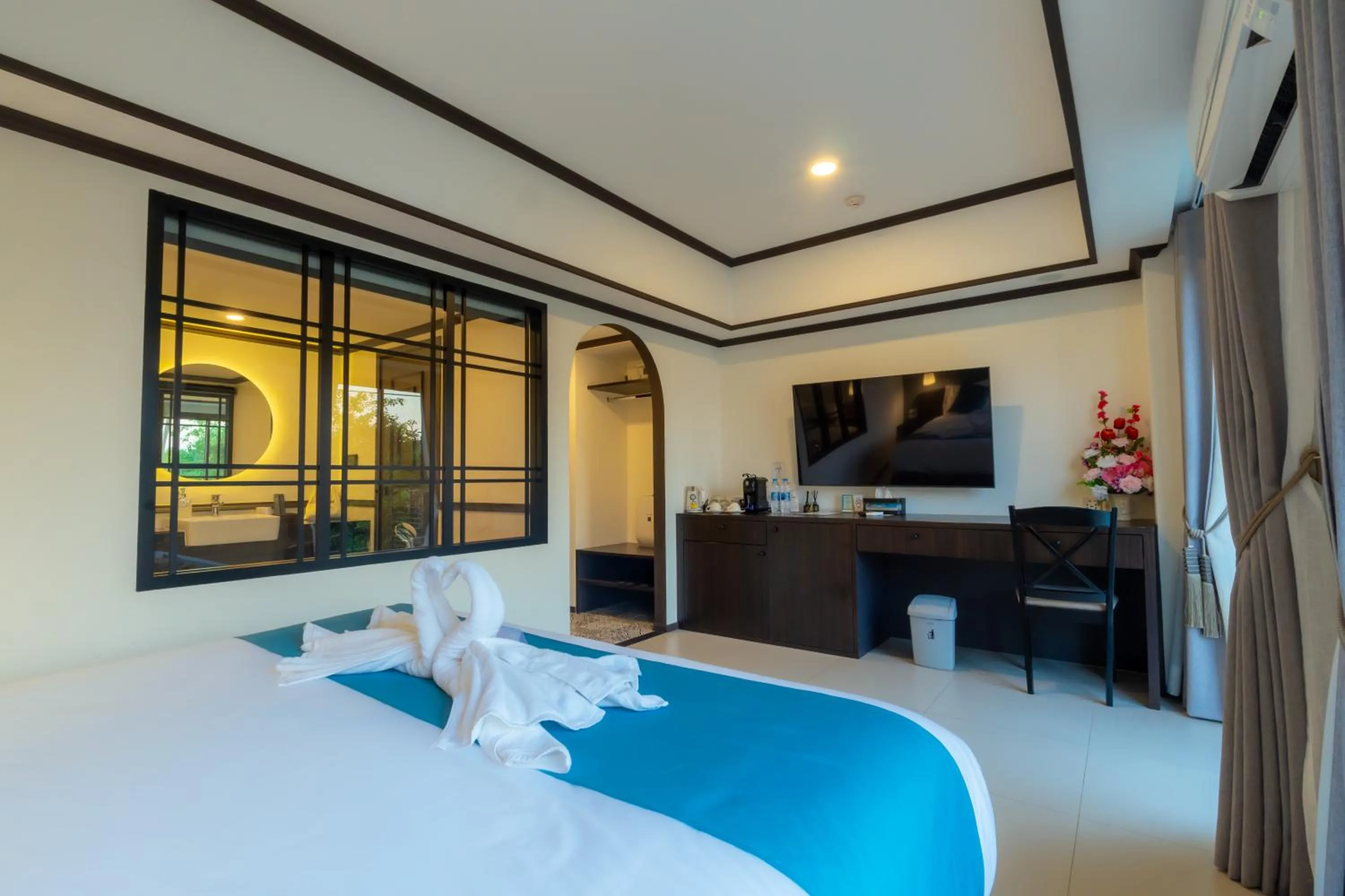 Bed in Le ville lanna Chiang Mai Gate Old Town Hotel