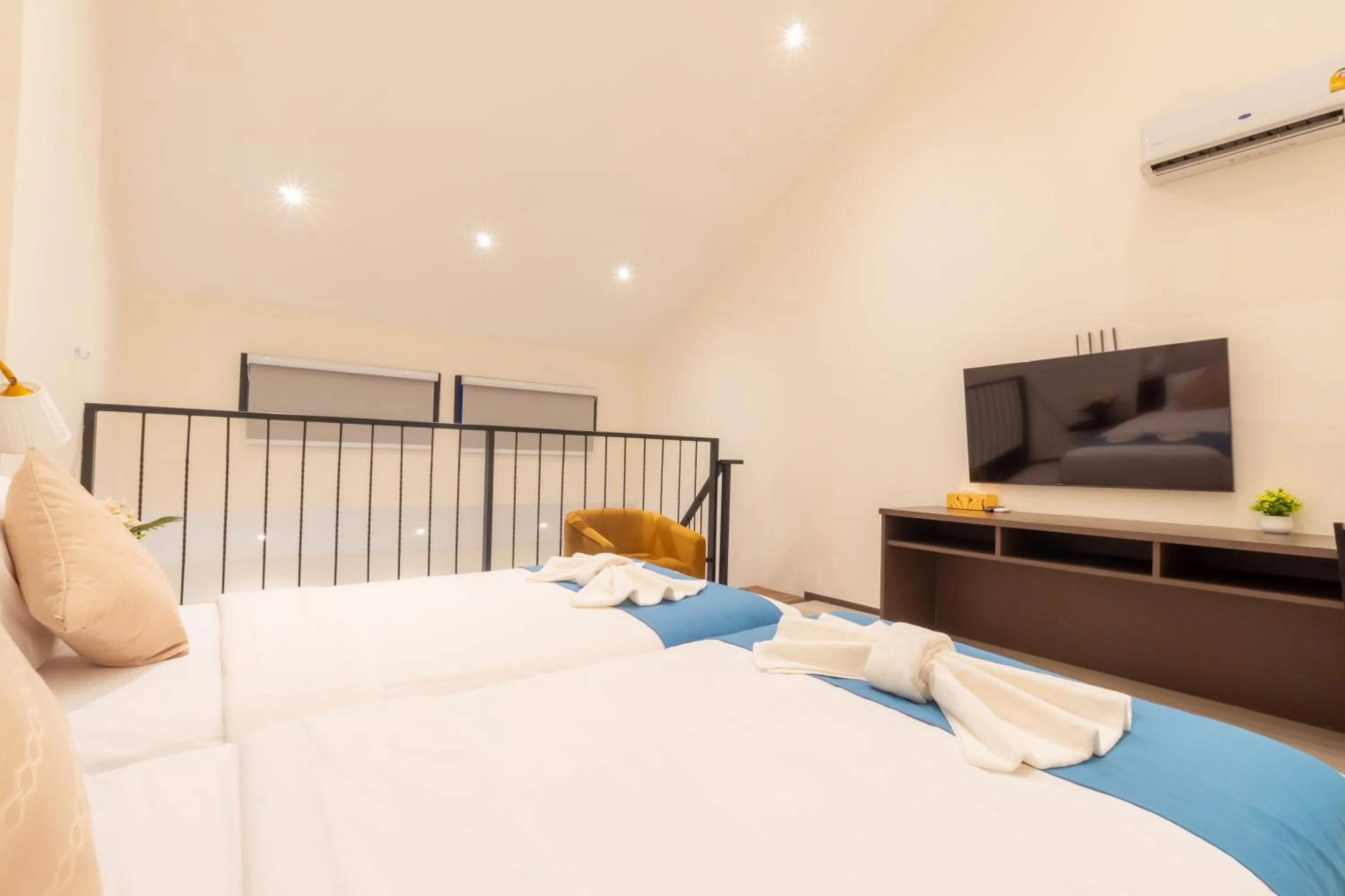 Bed in Le ville lanna Chiang Mai Gate Old Town Hotel