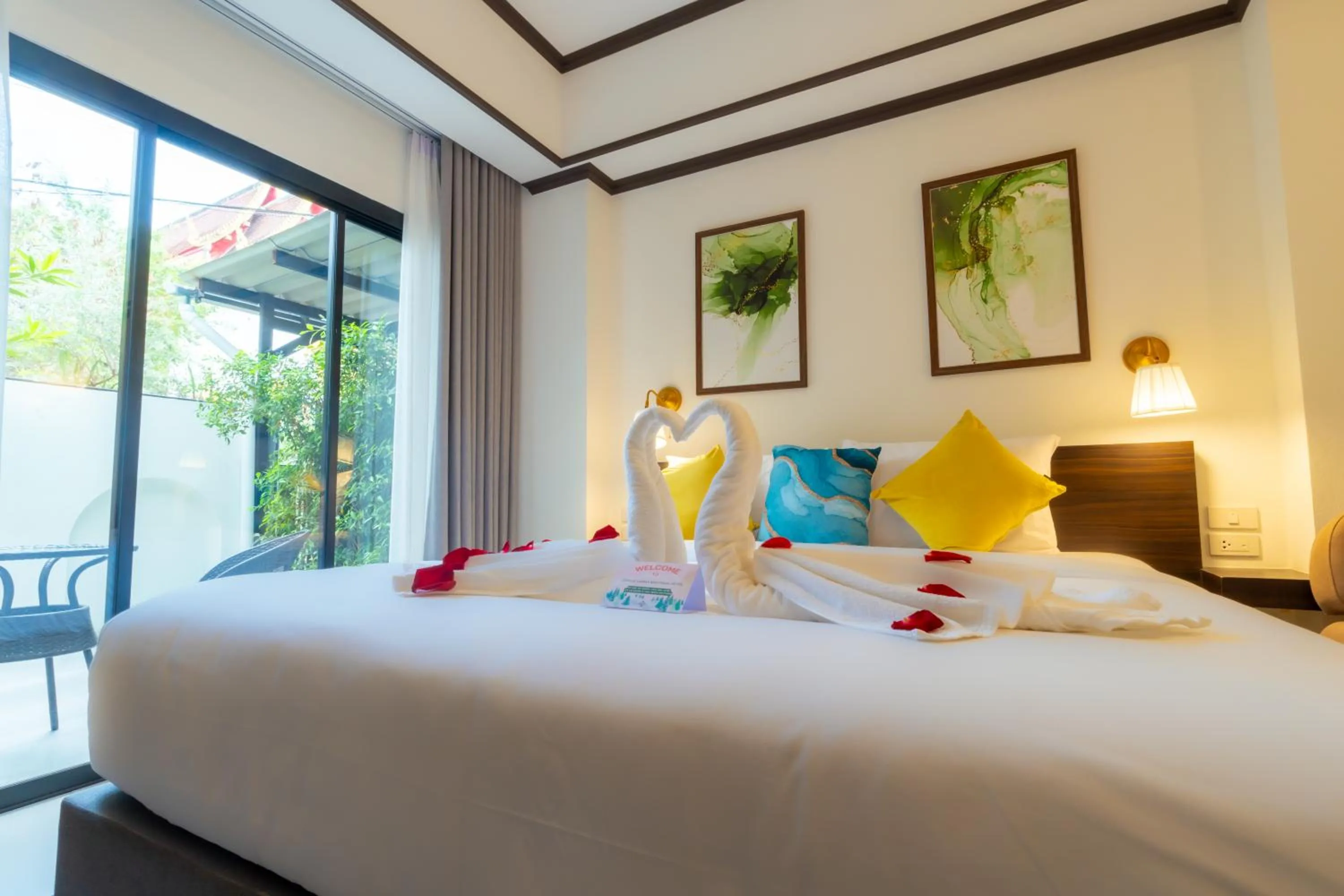 Bed in Le ville lanna Chiang Mai Gate Old Town Hotel