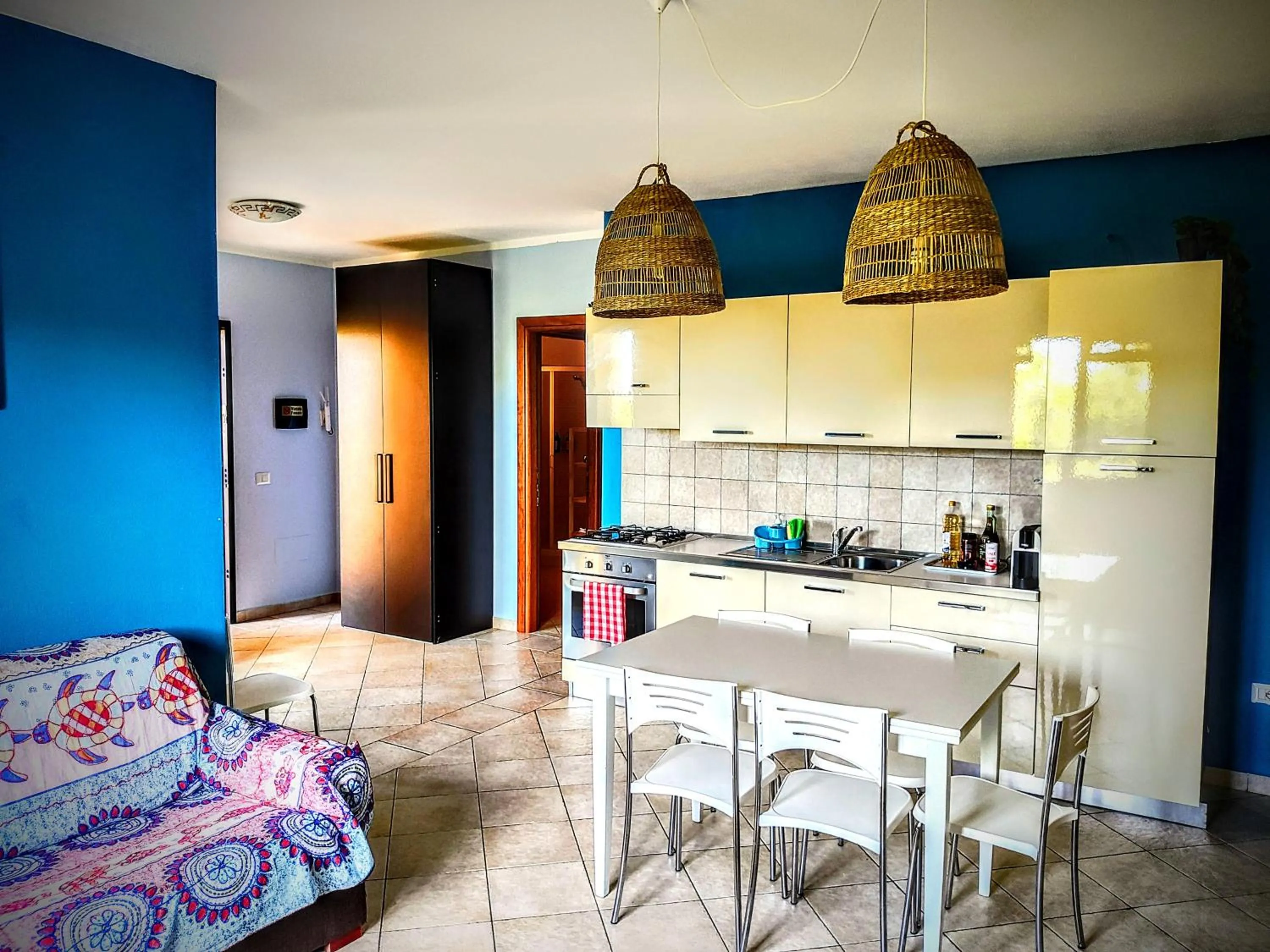 Kitchen or kitchenette in Residenze L'Isola Surf House