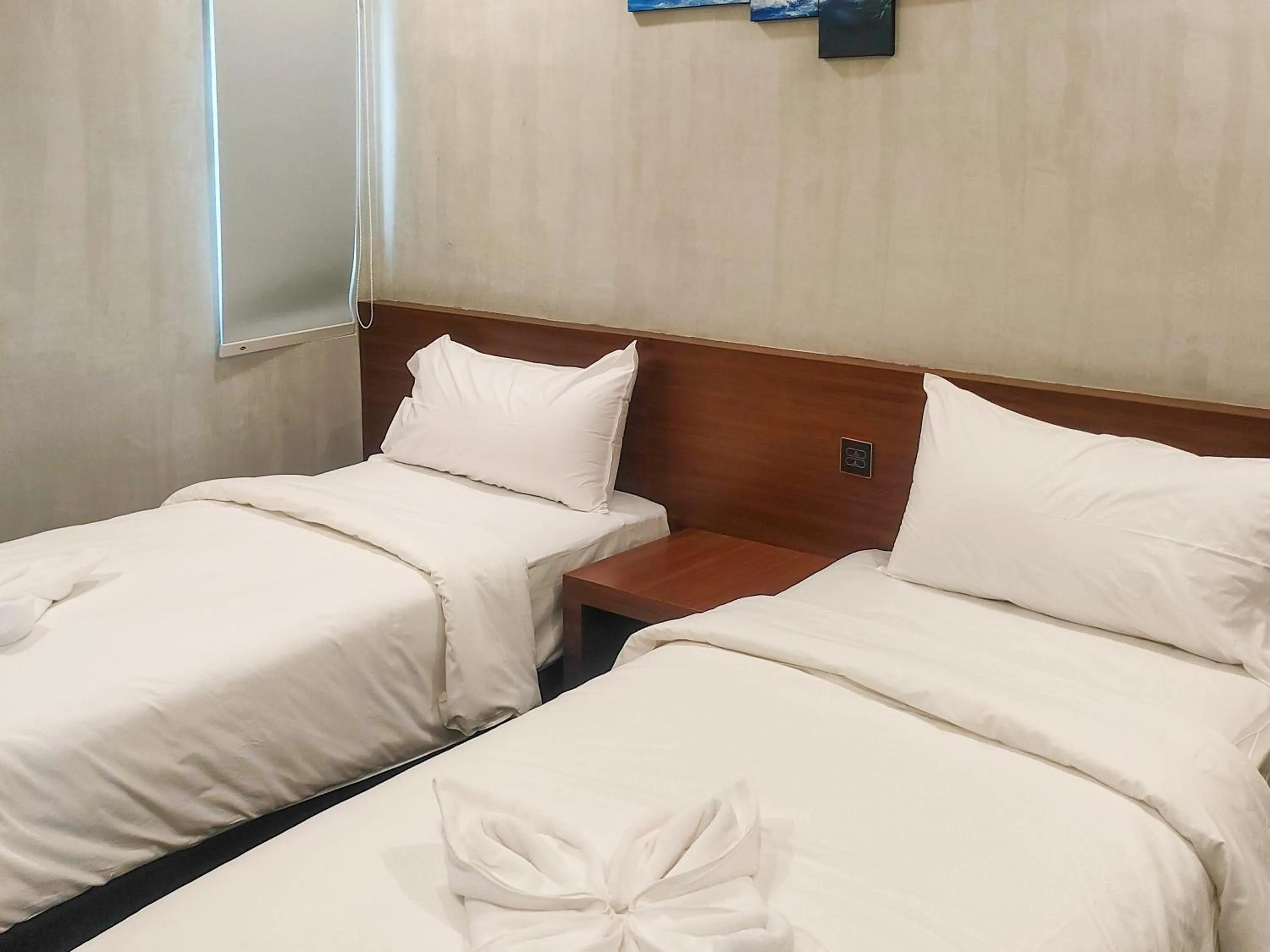 Bed in Travel Biz Hotel Medan Mitra RedDoorz