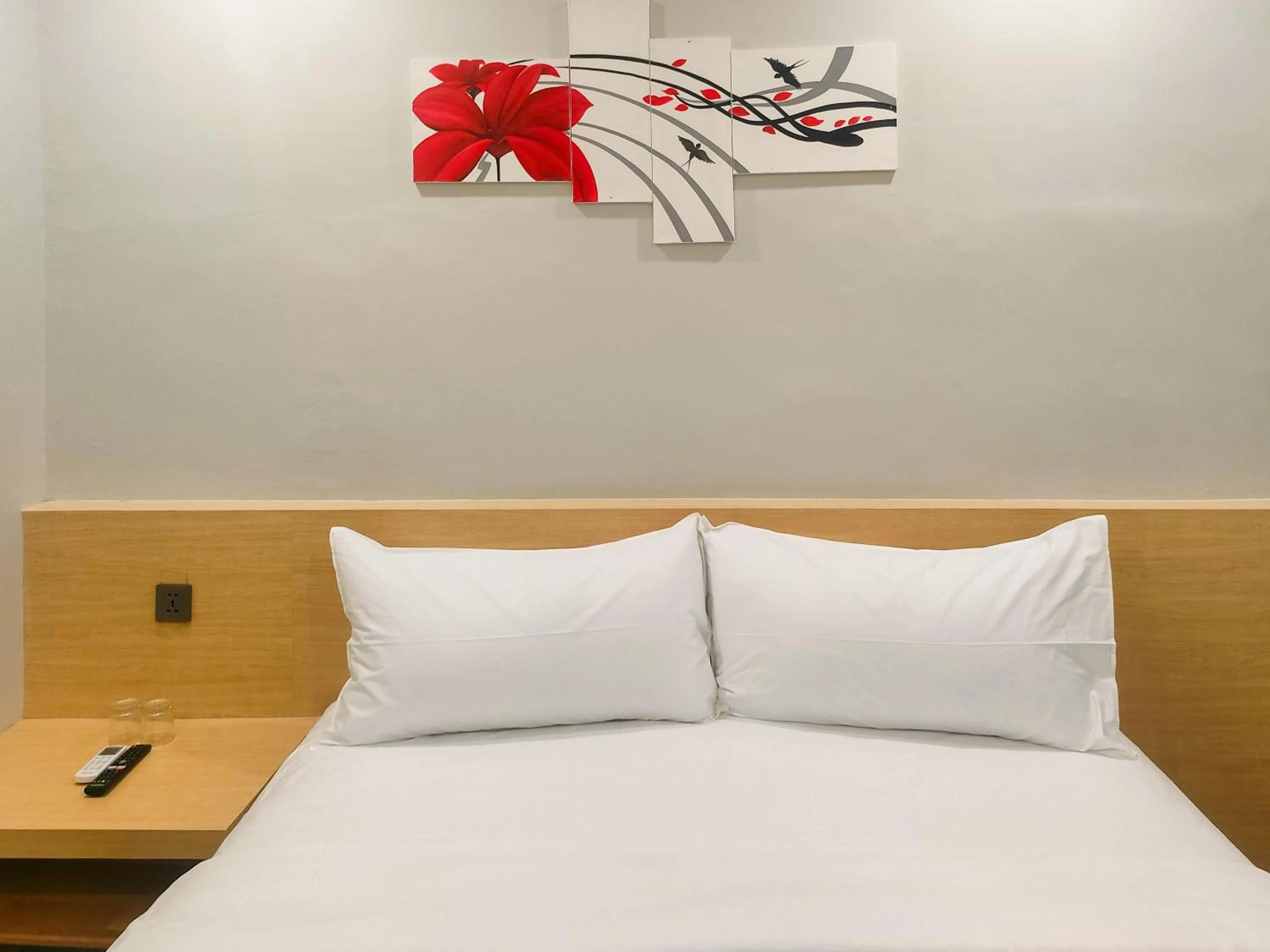 Bed in Travel Biz Hotel Medan Mitra RedDoorz