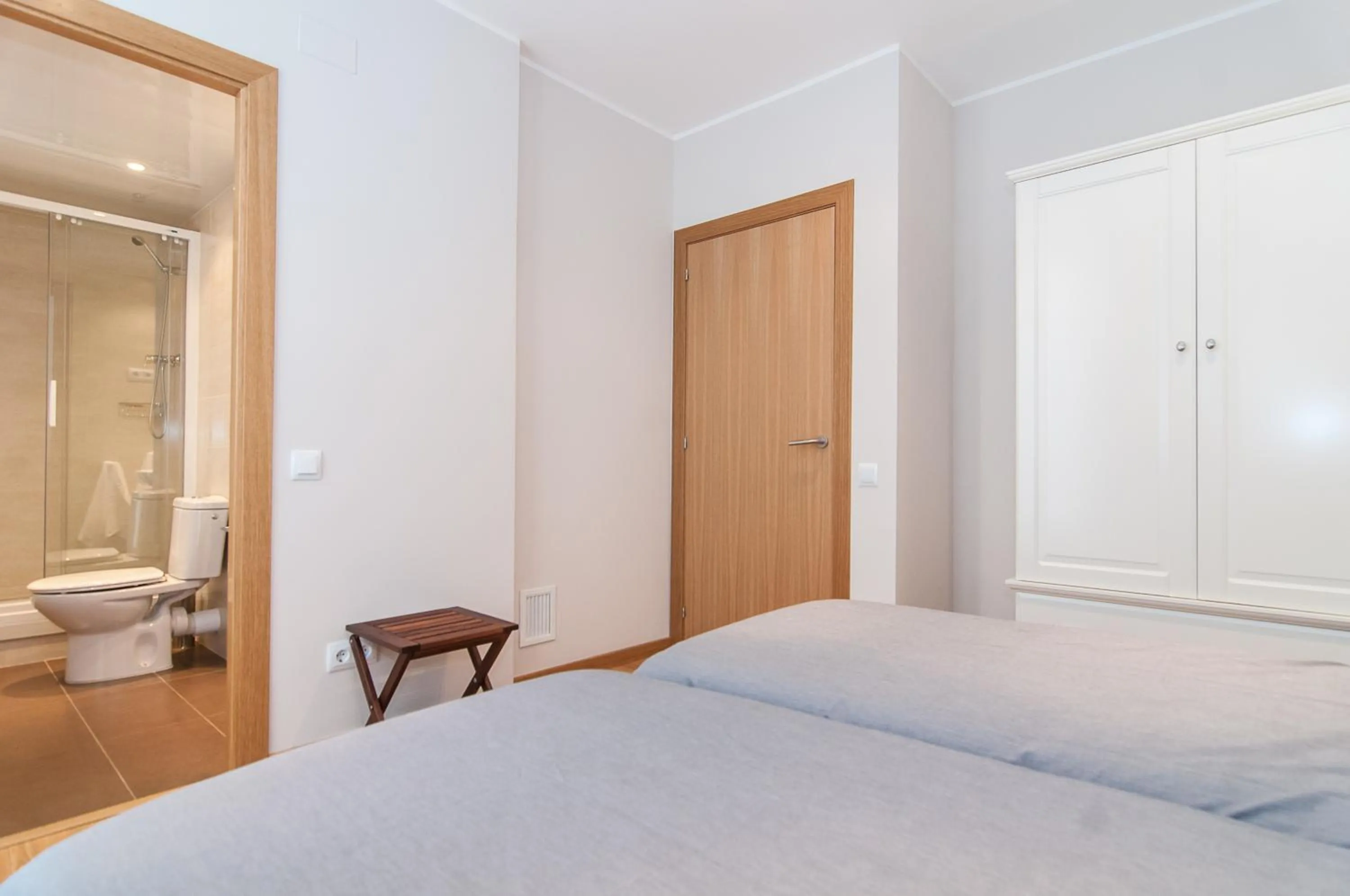 Bedroom, Bed in Pelayo Deluxe Apartments