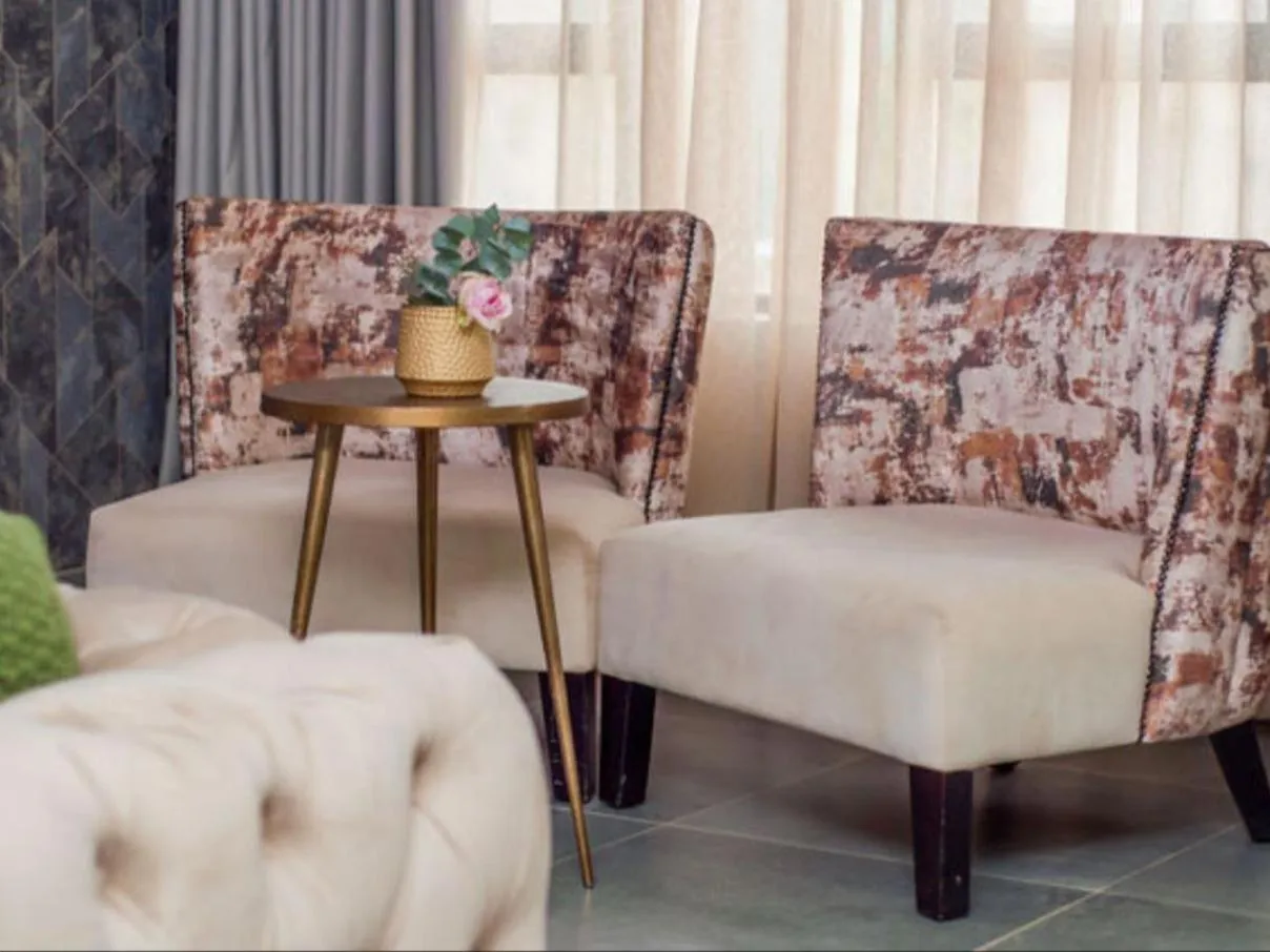 Seating area in The Lux Hotel and Resorts