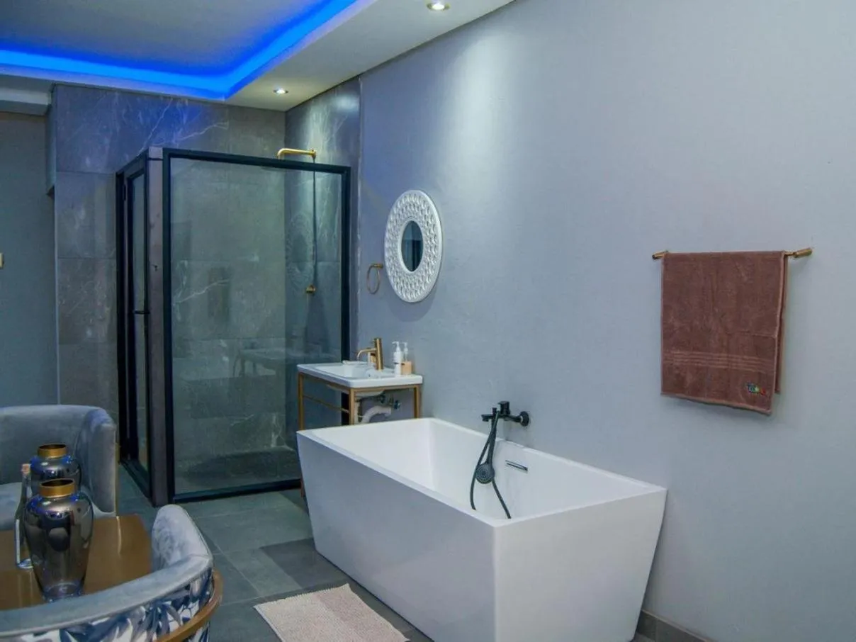 Bathroom in The Lux Hotel and Resorts