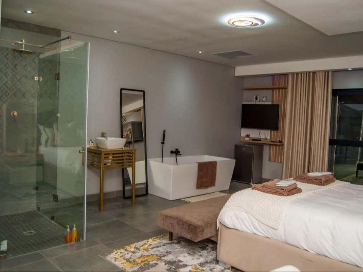 Photo of the whole room, Bed in The Lux Hotel and Resorts