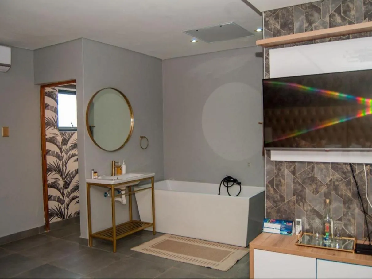 Bathroom in The Lux Hotel and Resorts