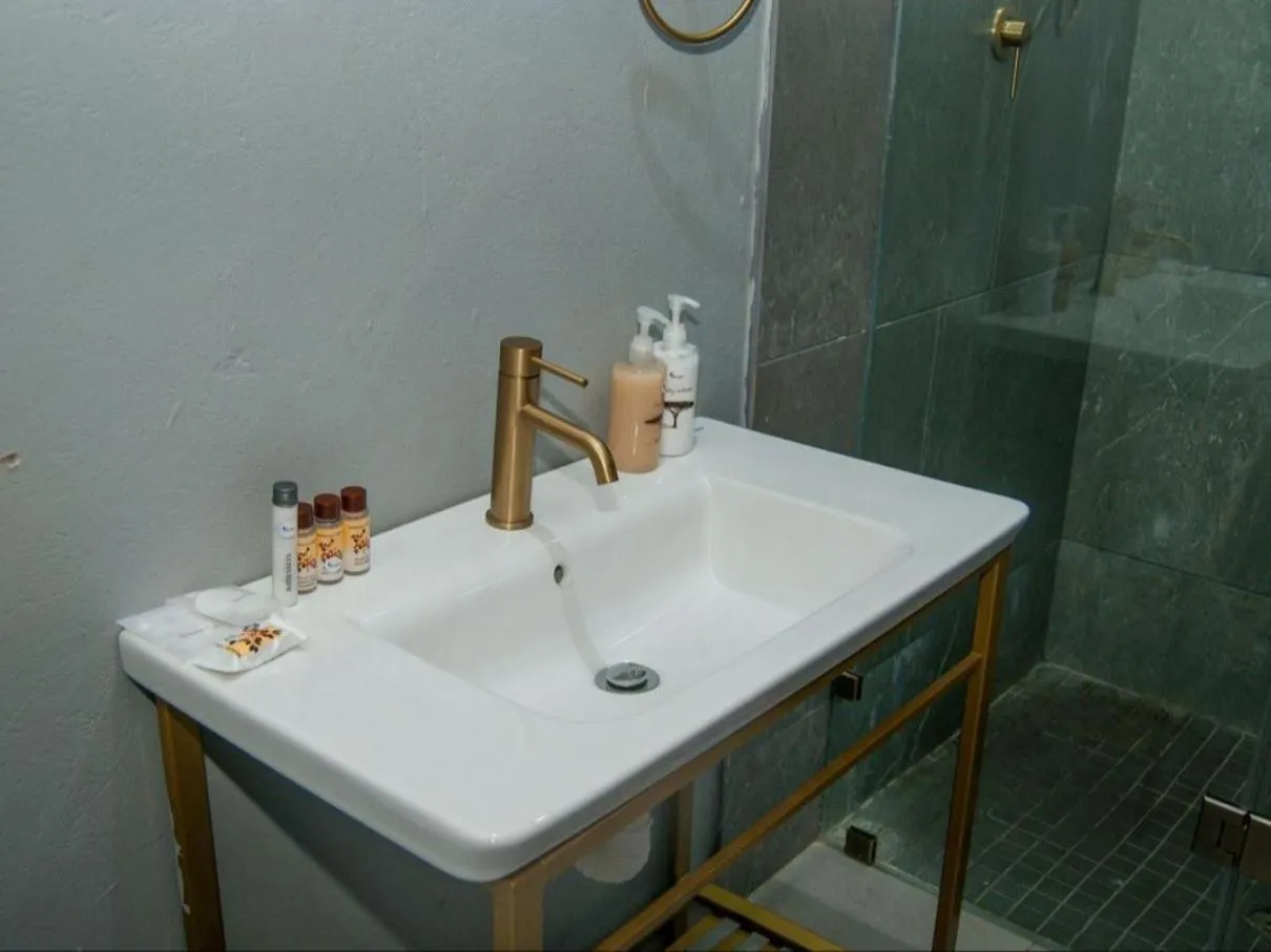 Shower in The Lux Hotel and Resorts