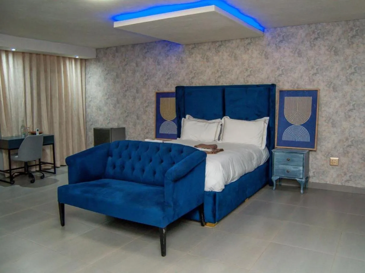 Bed in The Lux Hotel and Resorts